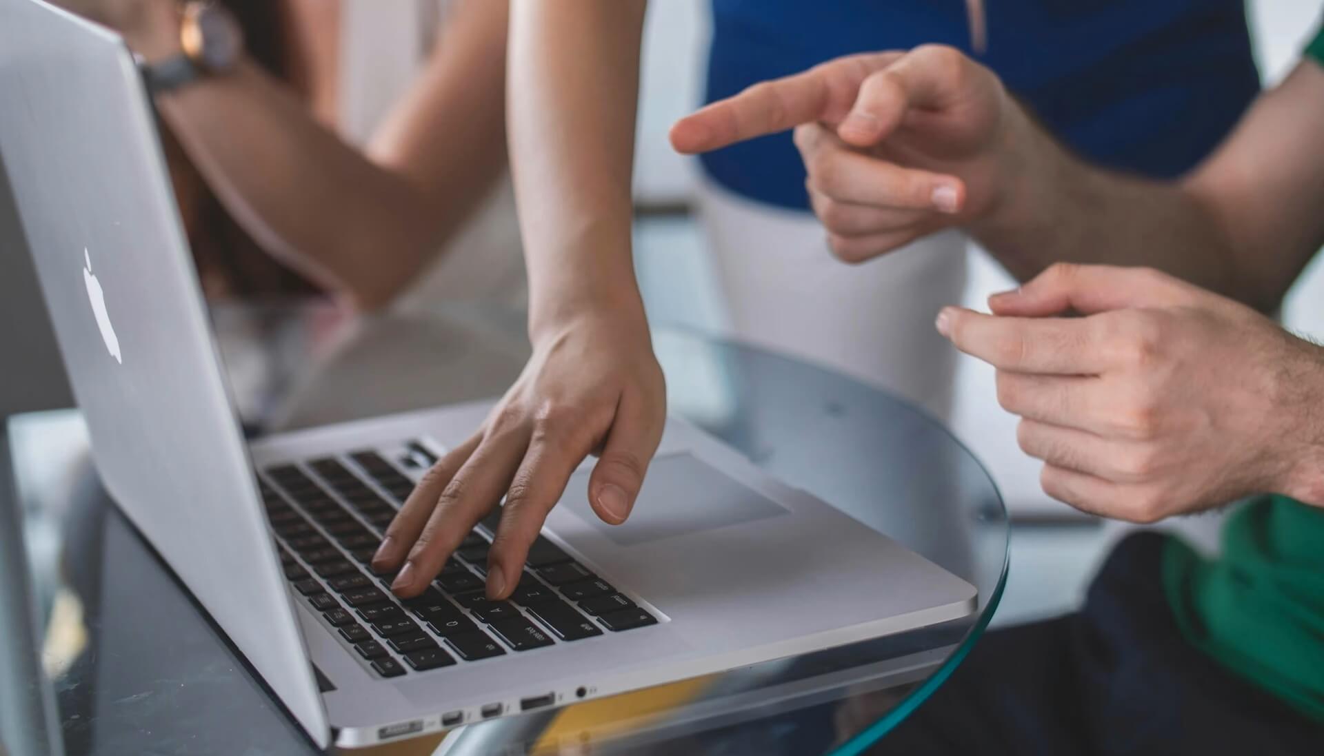 People working on a laptop