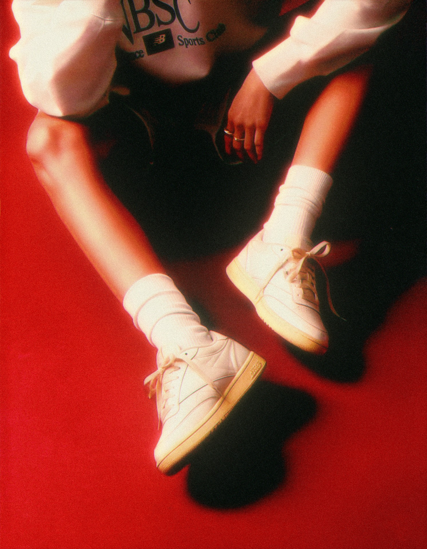 a blurry photo of a person standing in front of a wall