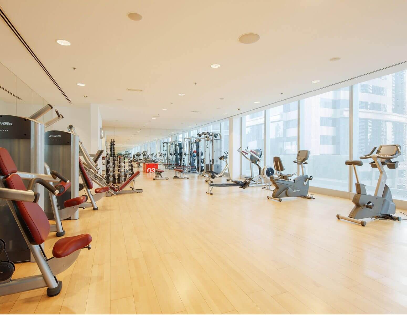 Fully equipped state-of-the-art fitness center available to residents of Rolex Tower luxury apartments.