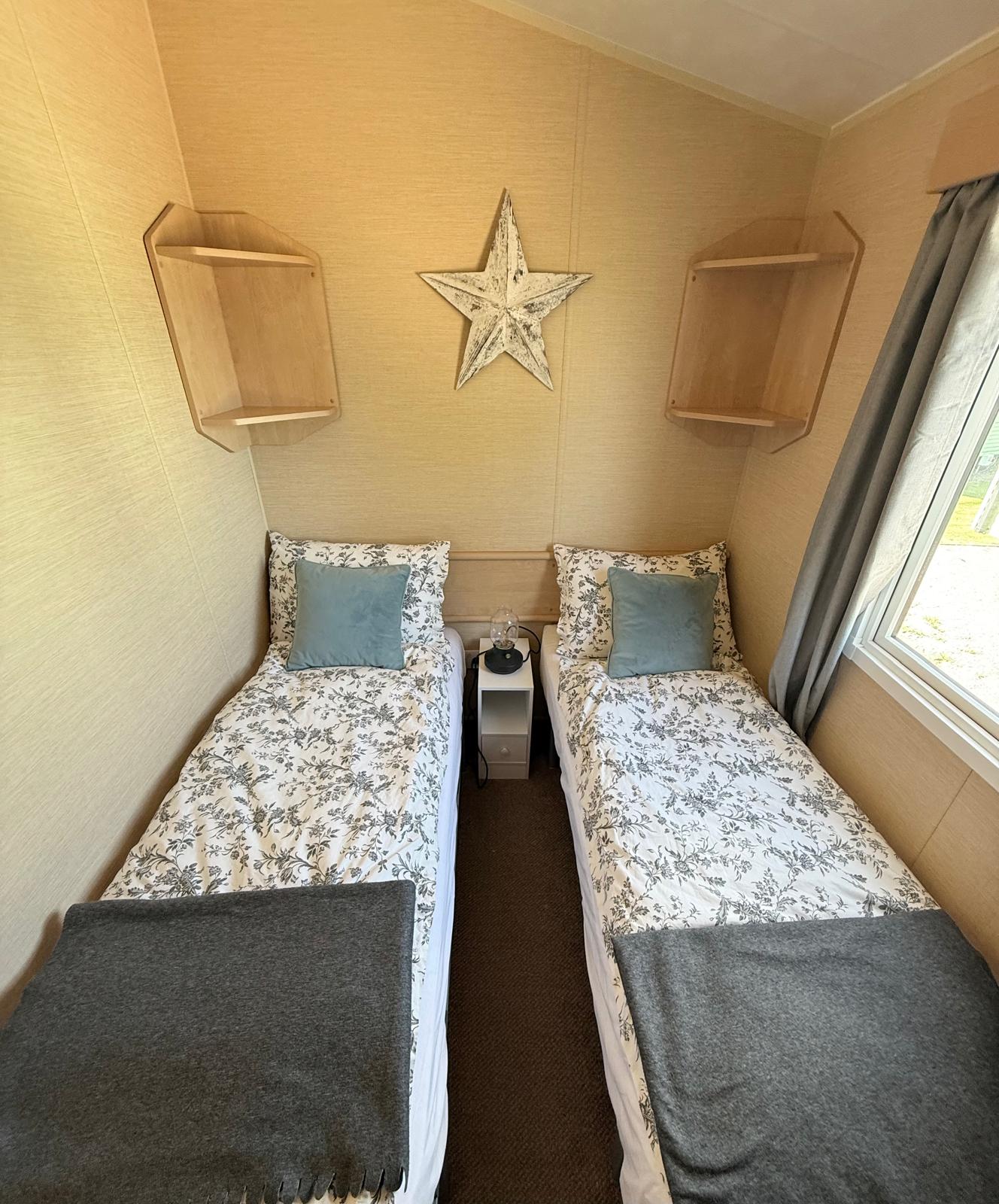 photo showcasing the size of the twin room and the natural lighting