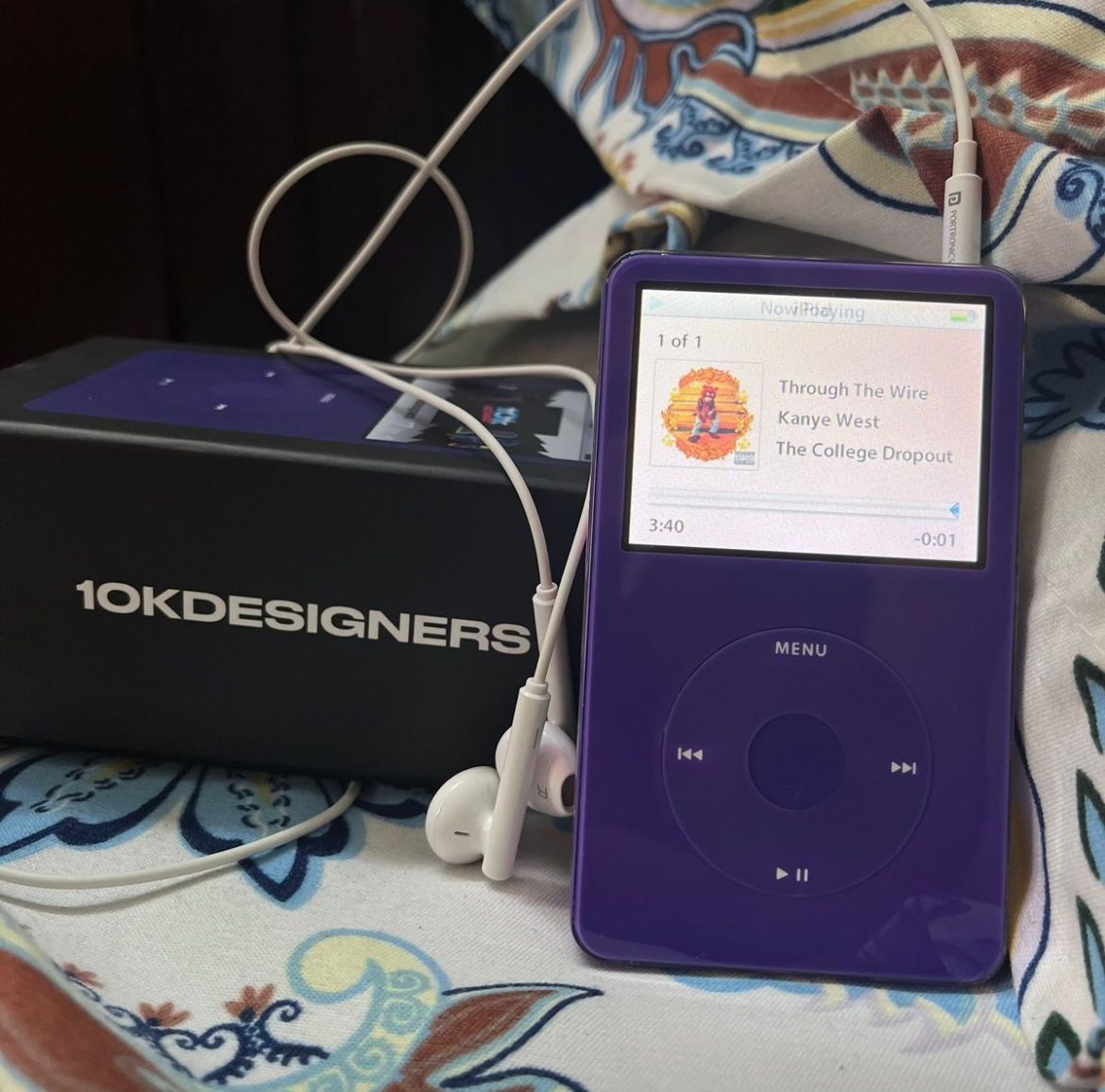 a person holding a small bowl of food