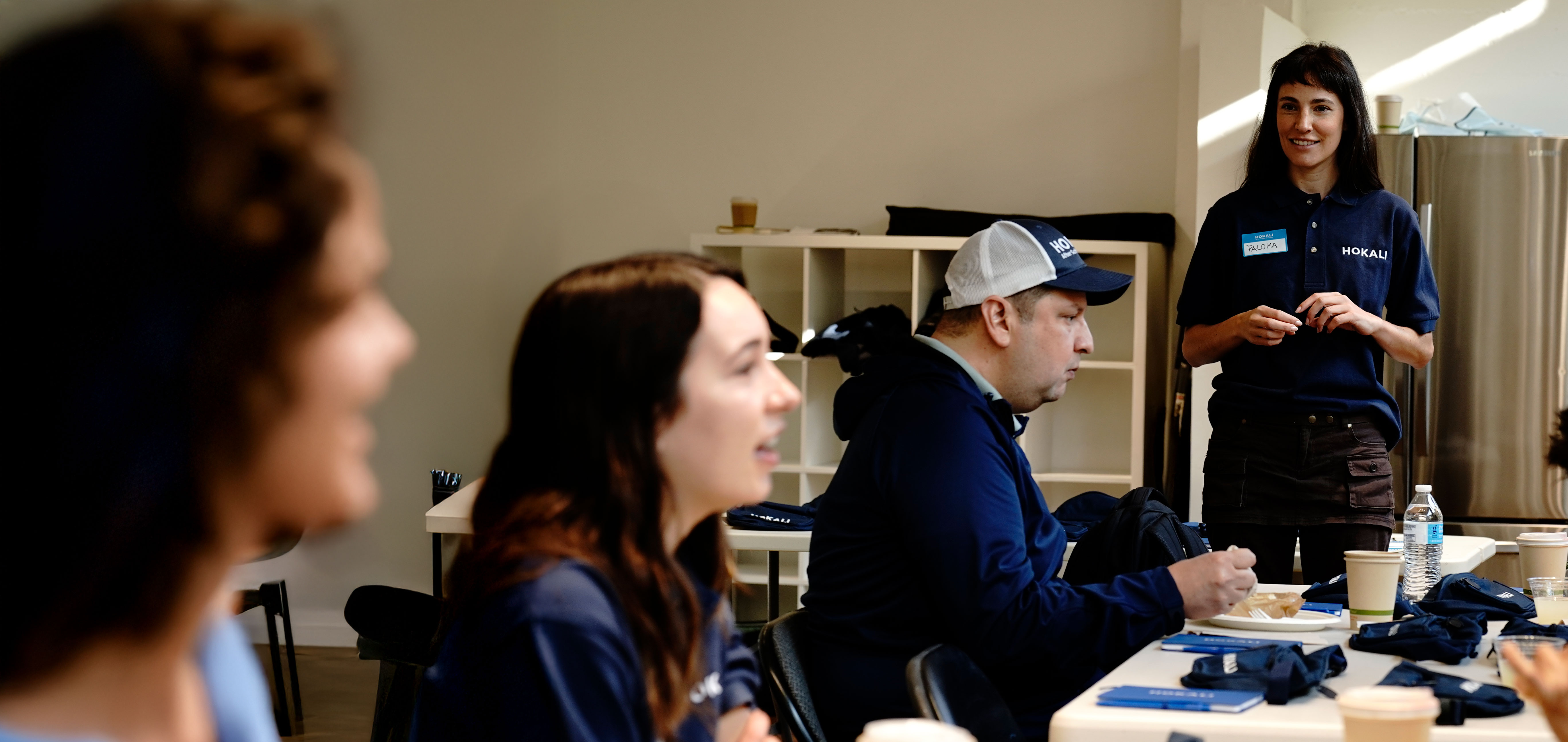 HOKALI Academy event with educators participating in a professional development session.