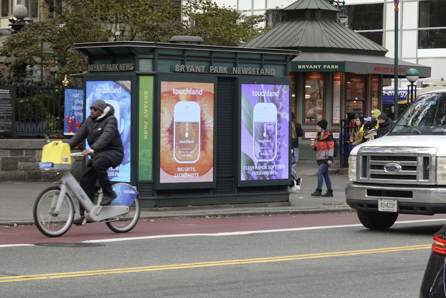 Streetside billboard with flyposters of the Batch.Works brand and illustrations