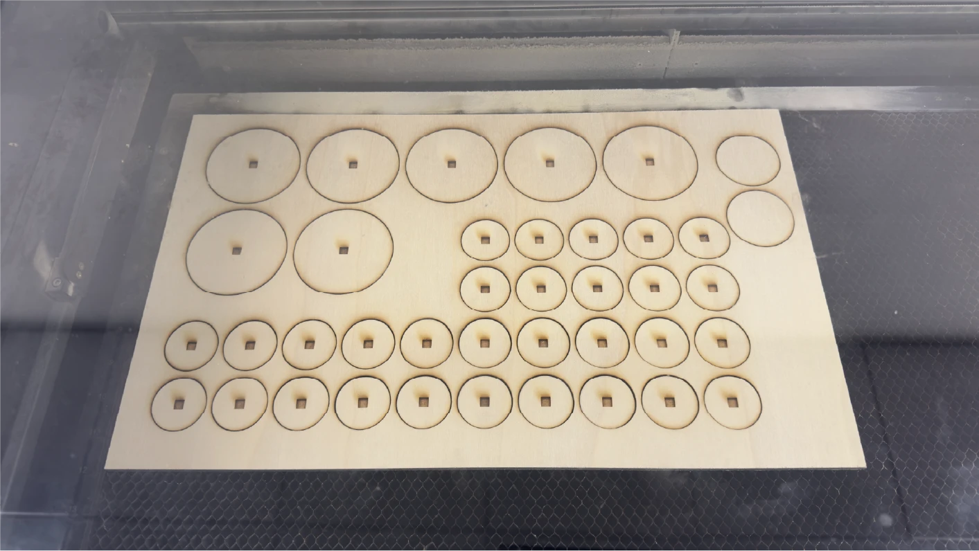 Laser cutting the circles for all my nodes.