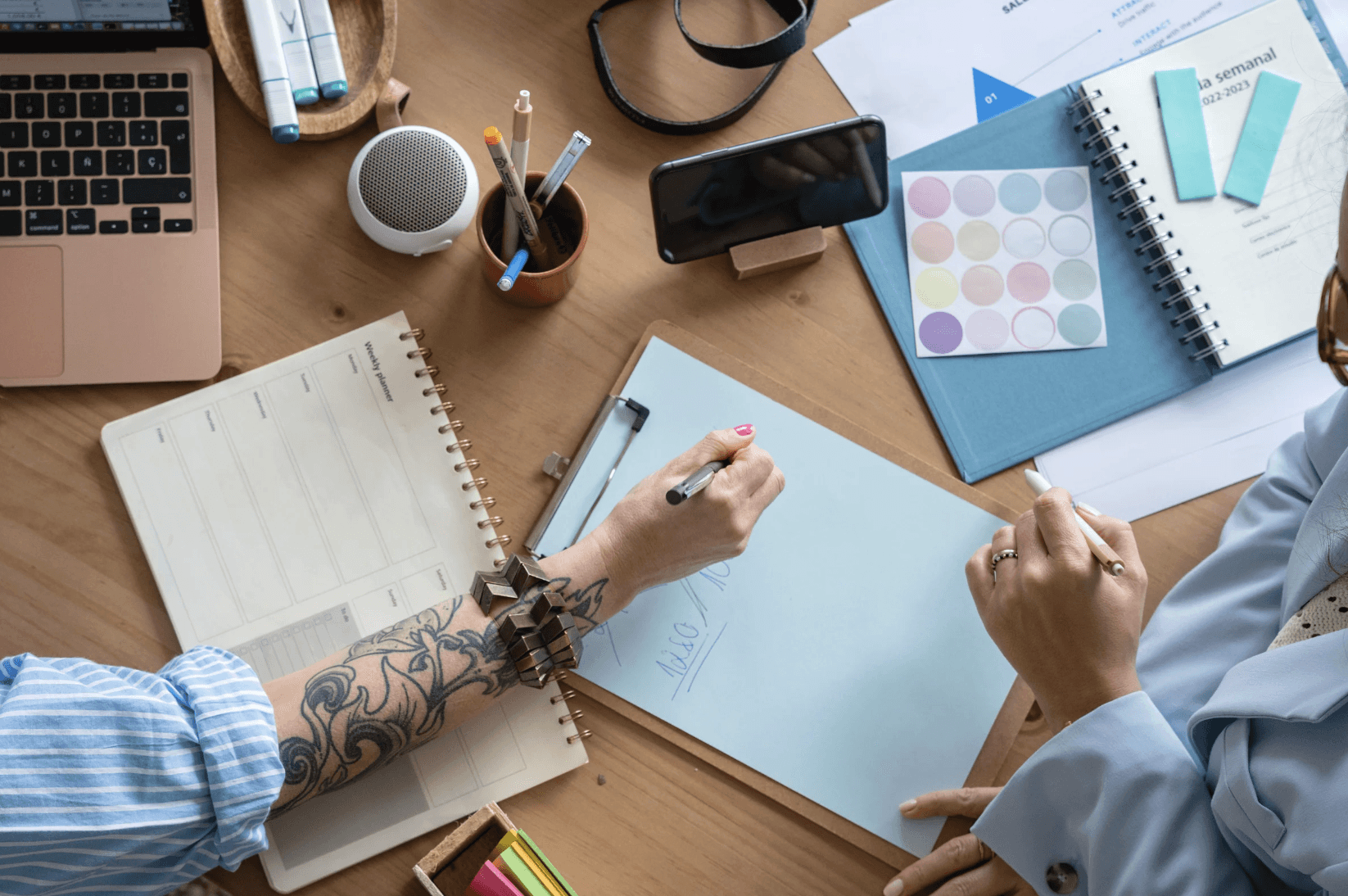A luxurious indoor spa area with a pool, lounge beds, and a breathtaking view of a city skyline at sunset. The golden lighting enhances the warm and tranquil atmosphere, creating a perfect relaxation retreat.