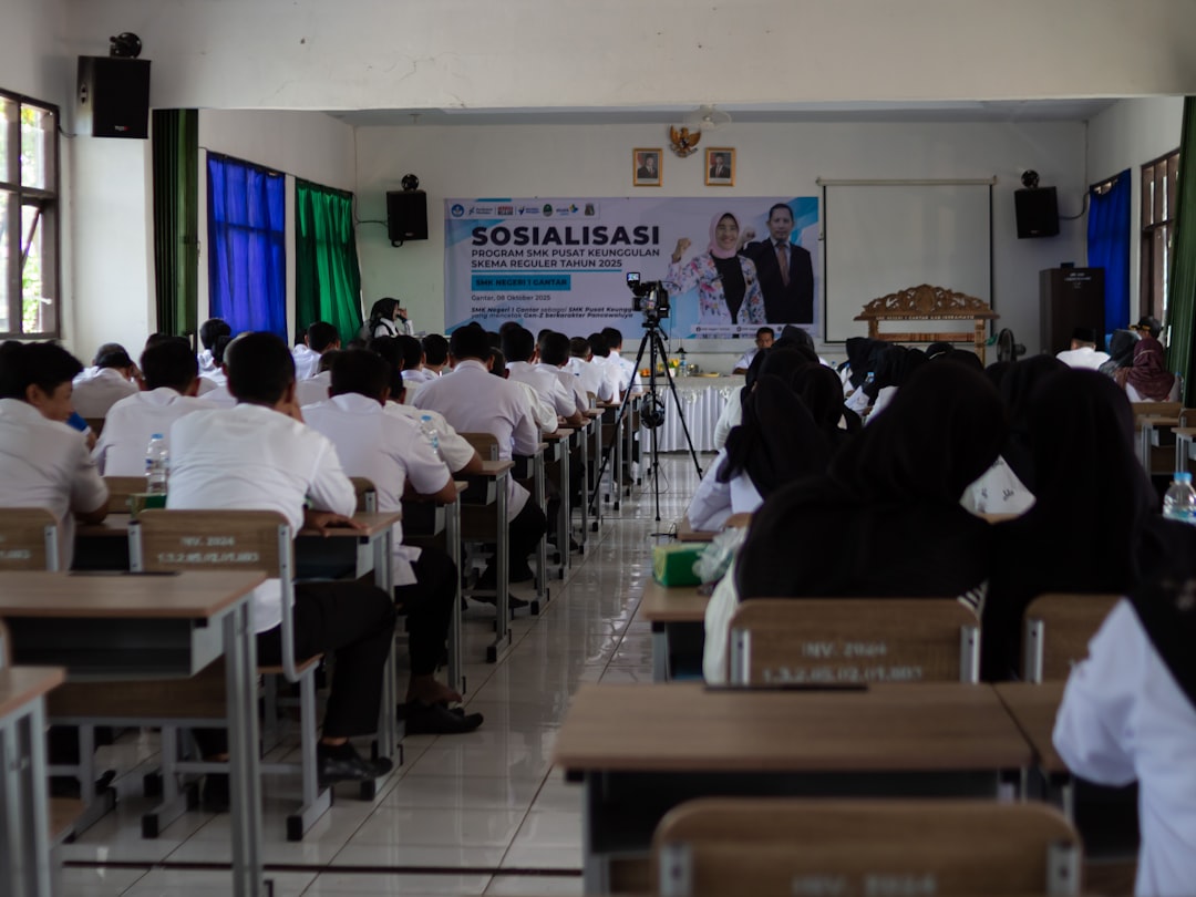 People attending a presentation in a classroom.