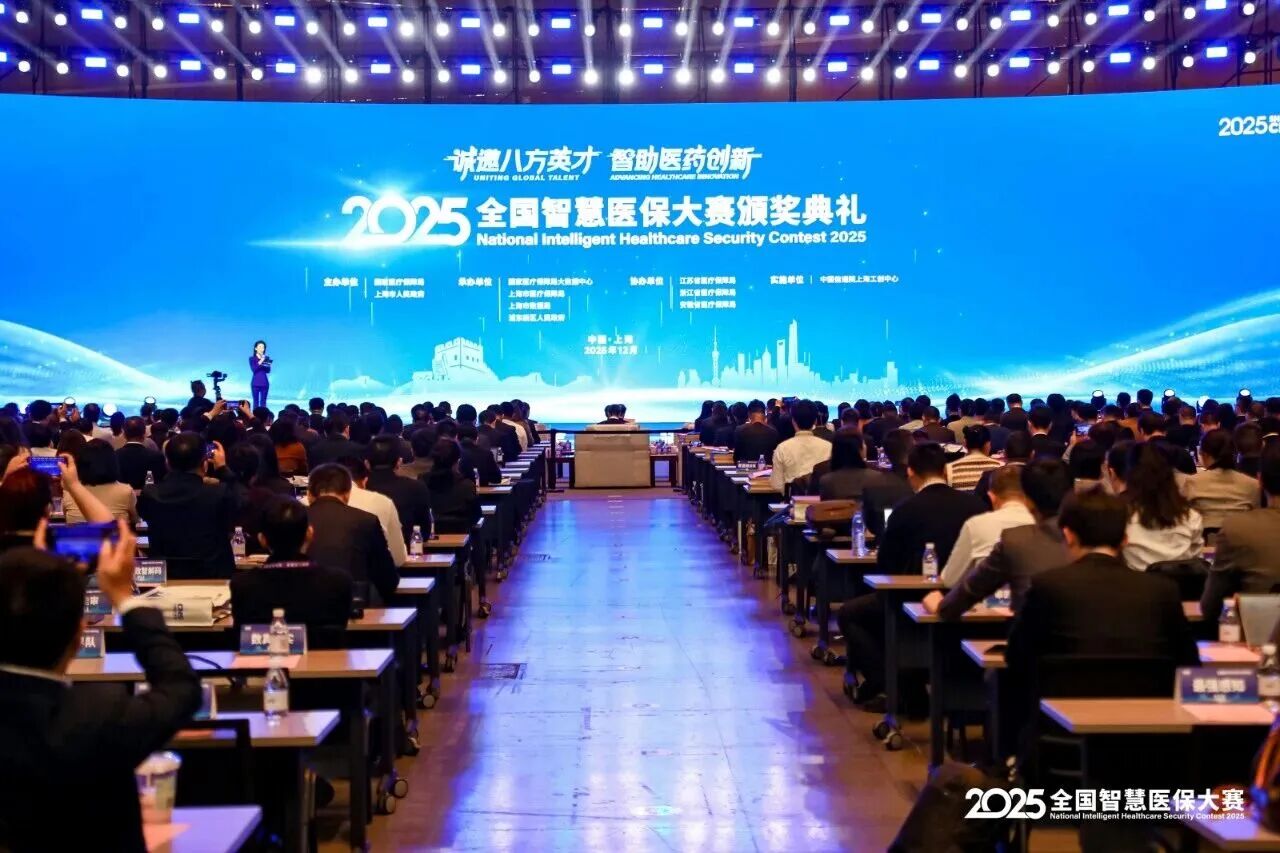 A cozy workspace featuring a wooden desk, a lamp, books, and a plant, illuminated by warm sunlight.