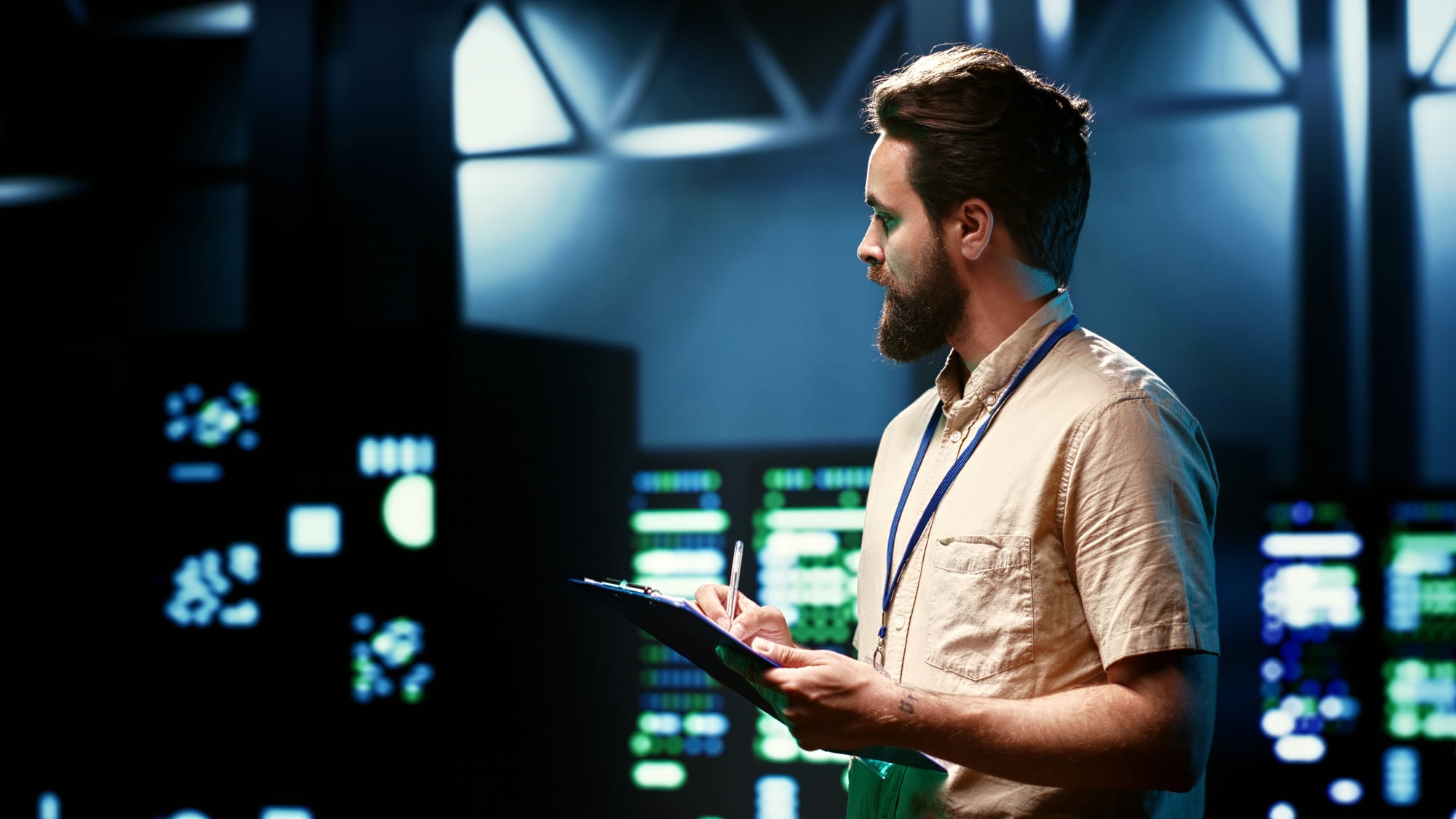 woman sitting around table holding tablet