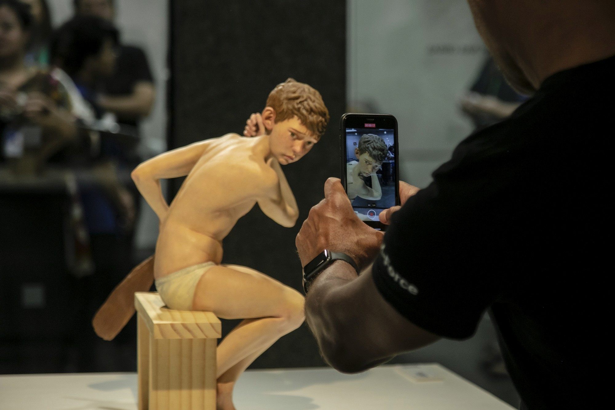 brown and white concrete buildings under white clouds during daytime