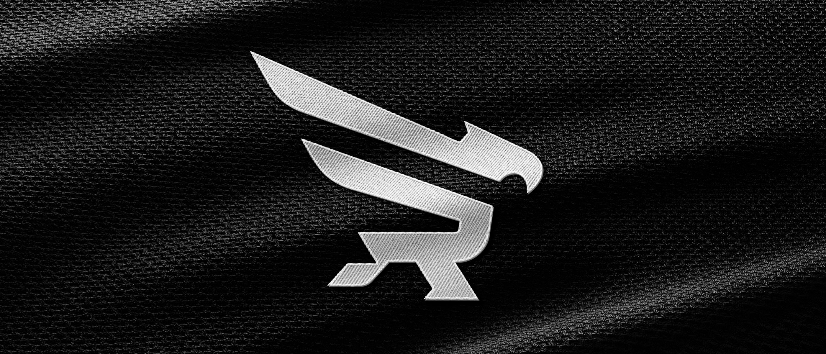 Revolution Athletics eagle logo mocked up on jersey mesh.