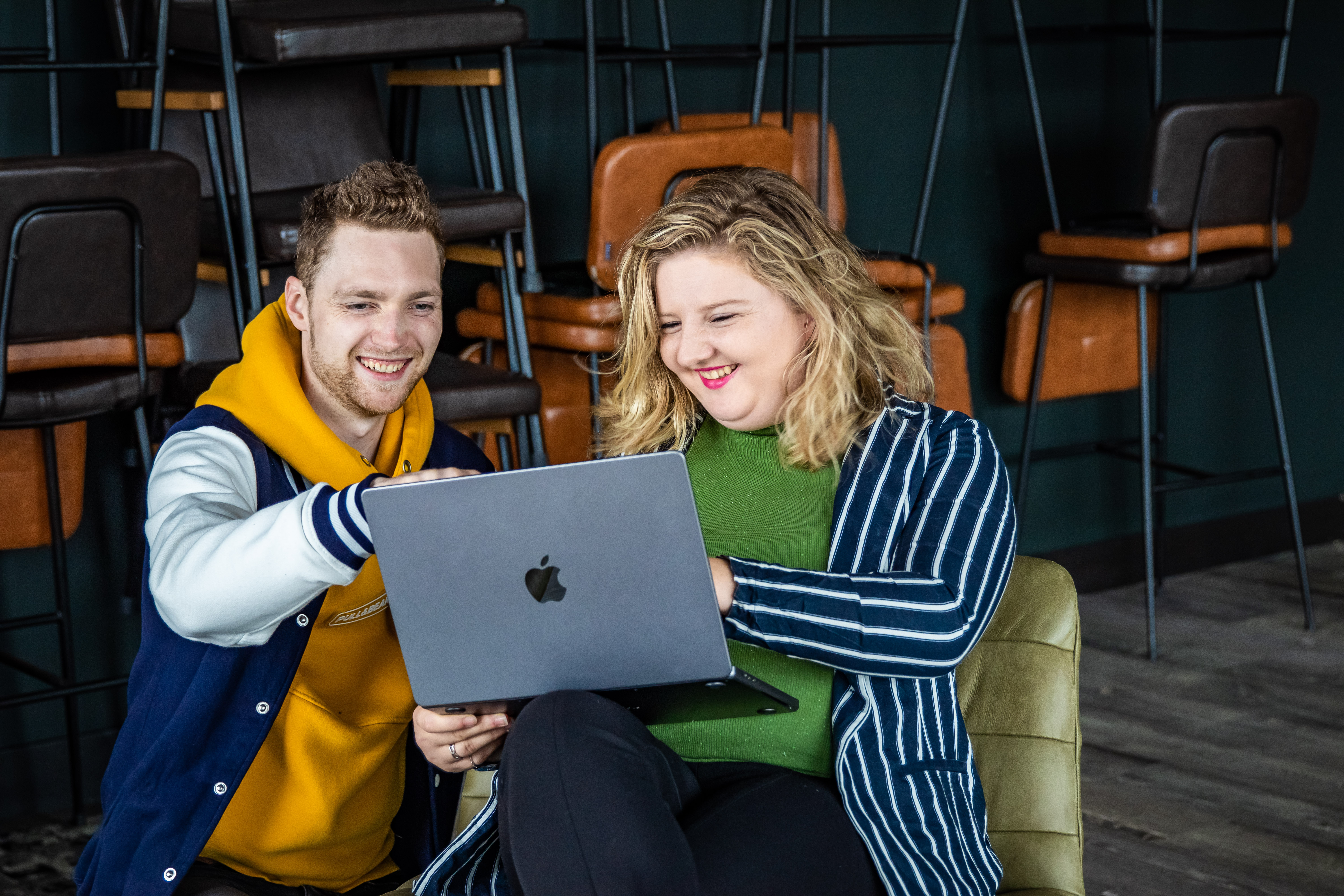 2 people working in a library