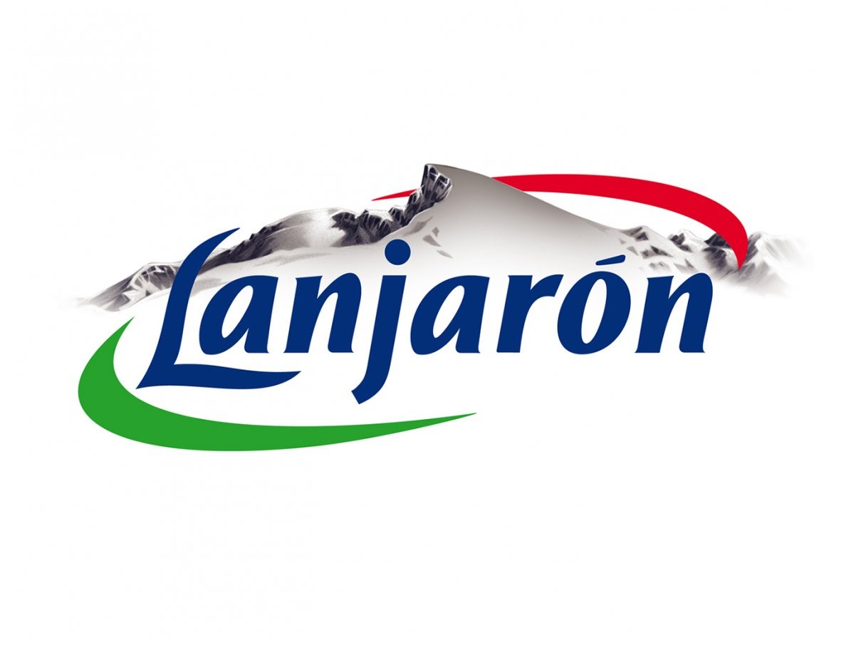 Rustic cabin in a golden field at sunset