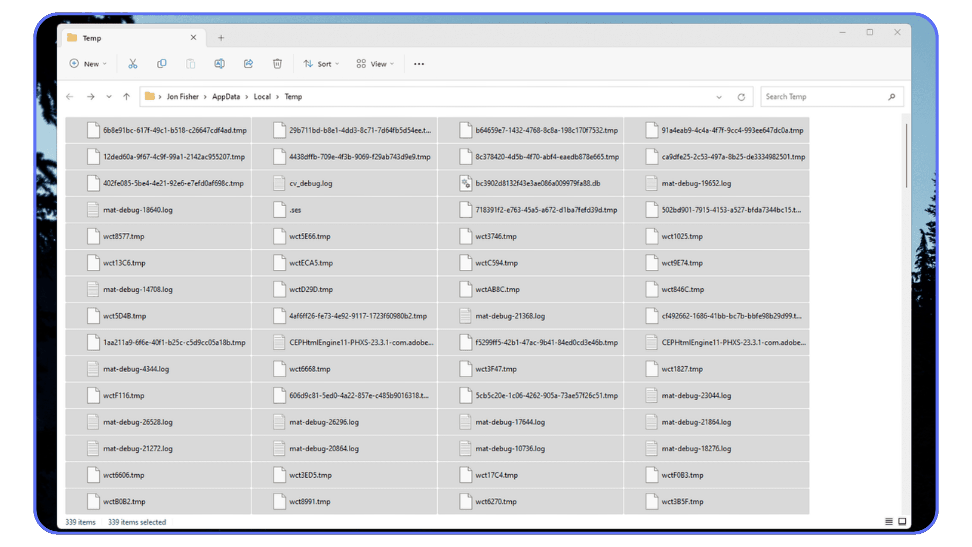 Screenshot of a Windows Temp directory containing a large number of .tmp and log files that can be safely deleted to recover disk space.