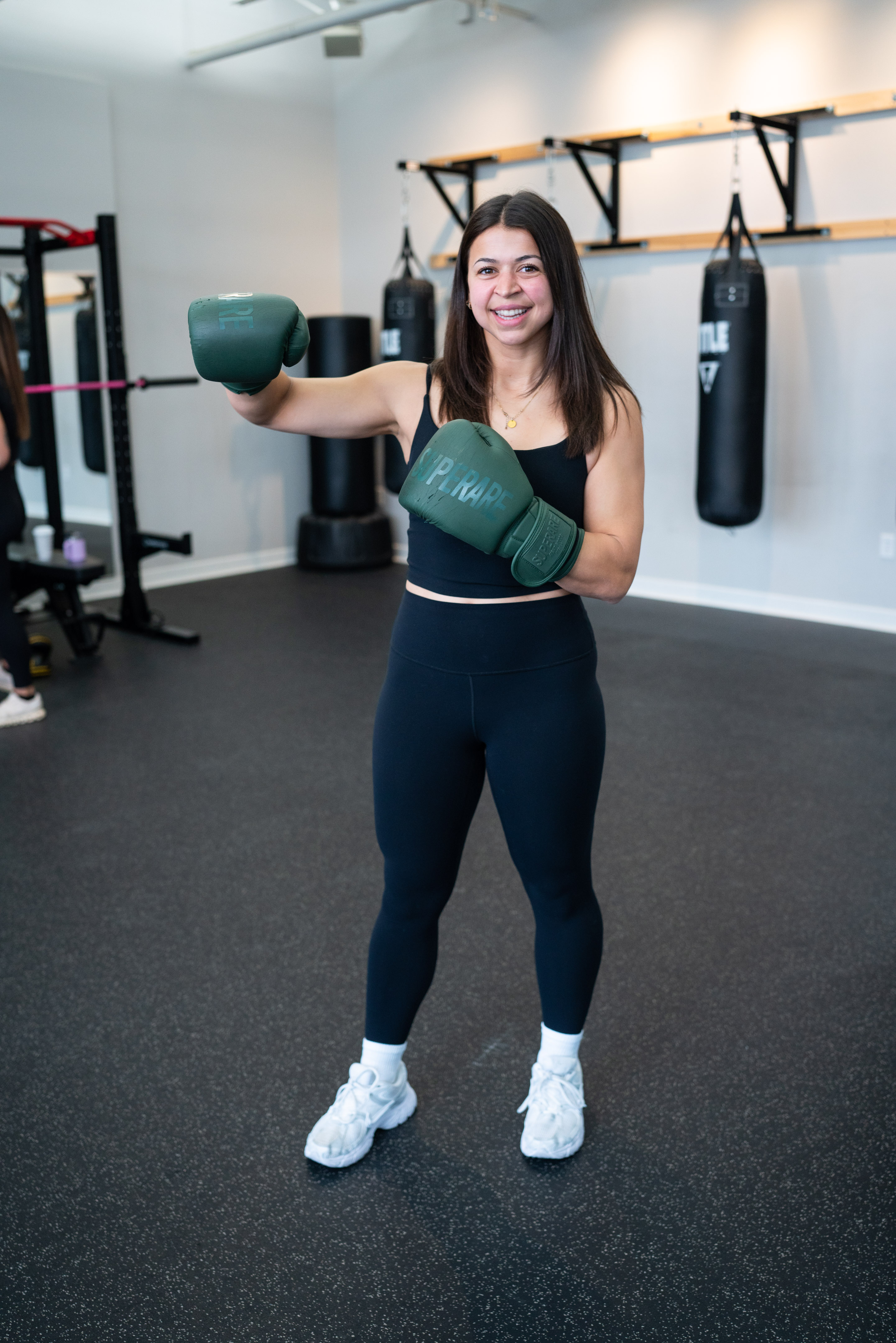 Gym Instructor with boxing gloves in Anchor Fitness Pewaukee
