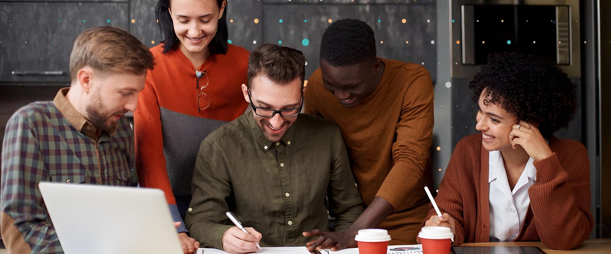 people looking at paper notes