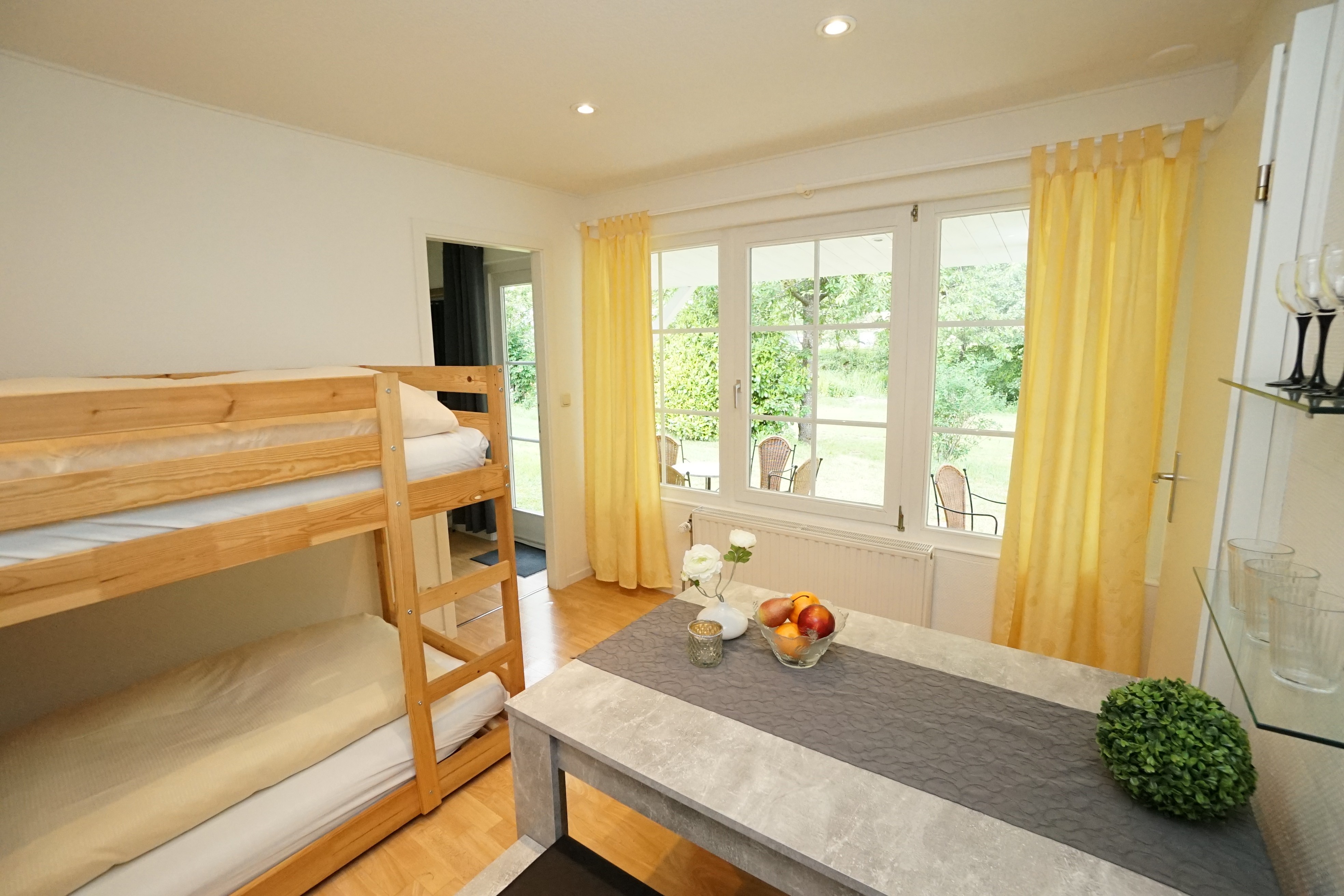 Additional room with loft bed and table