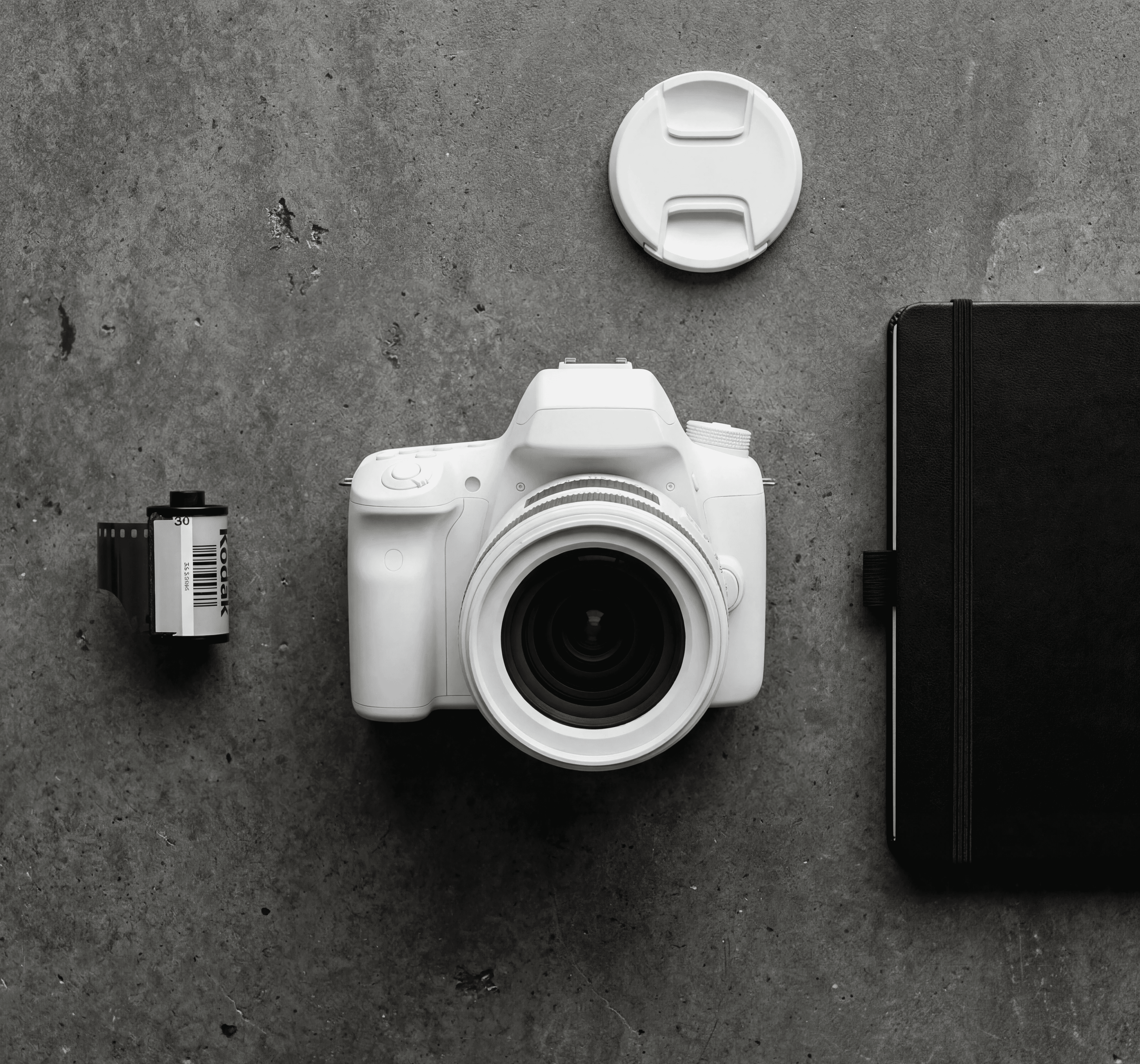 WhiteFrame X1 Camera on concrete with accesories