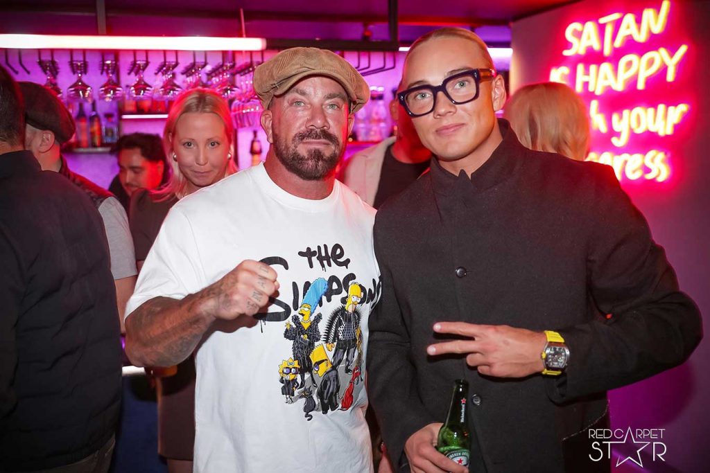 Dark and moody shot of a cocktail sitting on a bar