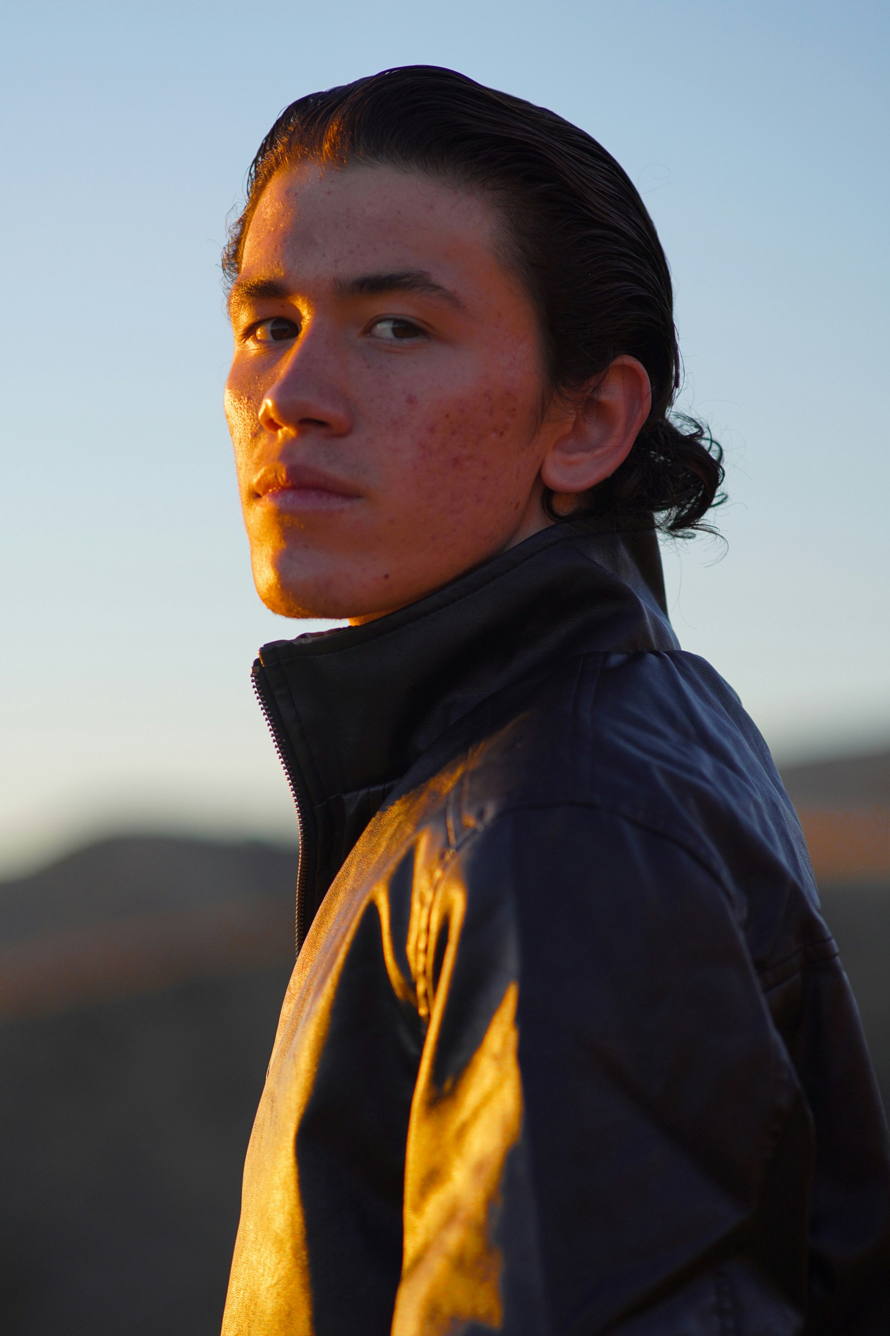 woman in black and yellow hoodie