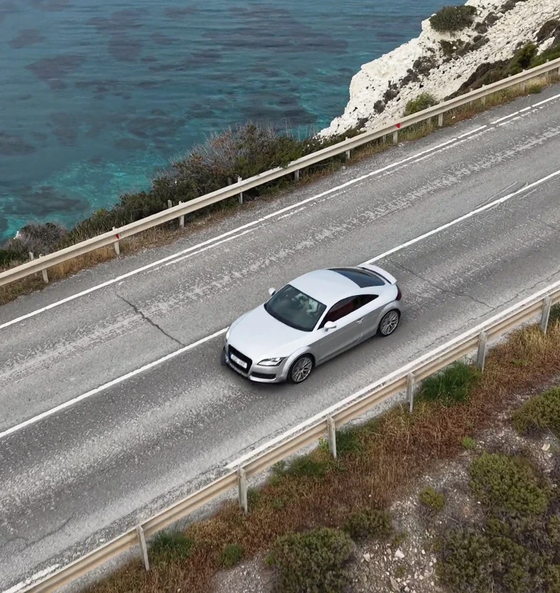 gray mercedes benz coupe on black asphalt road during daytime
