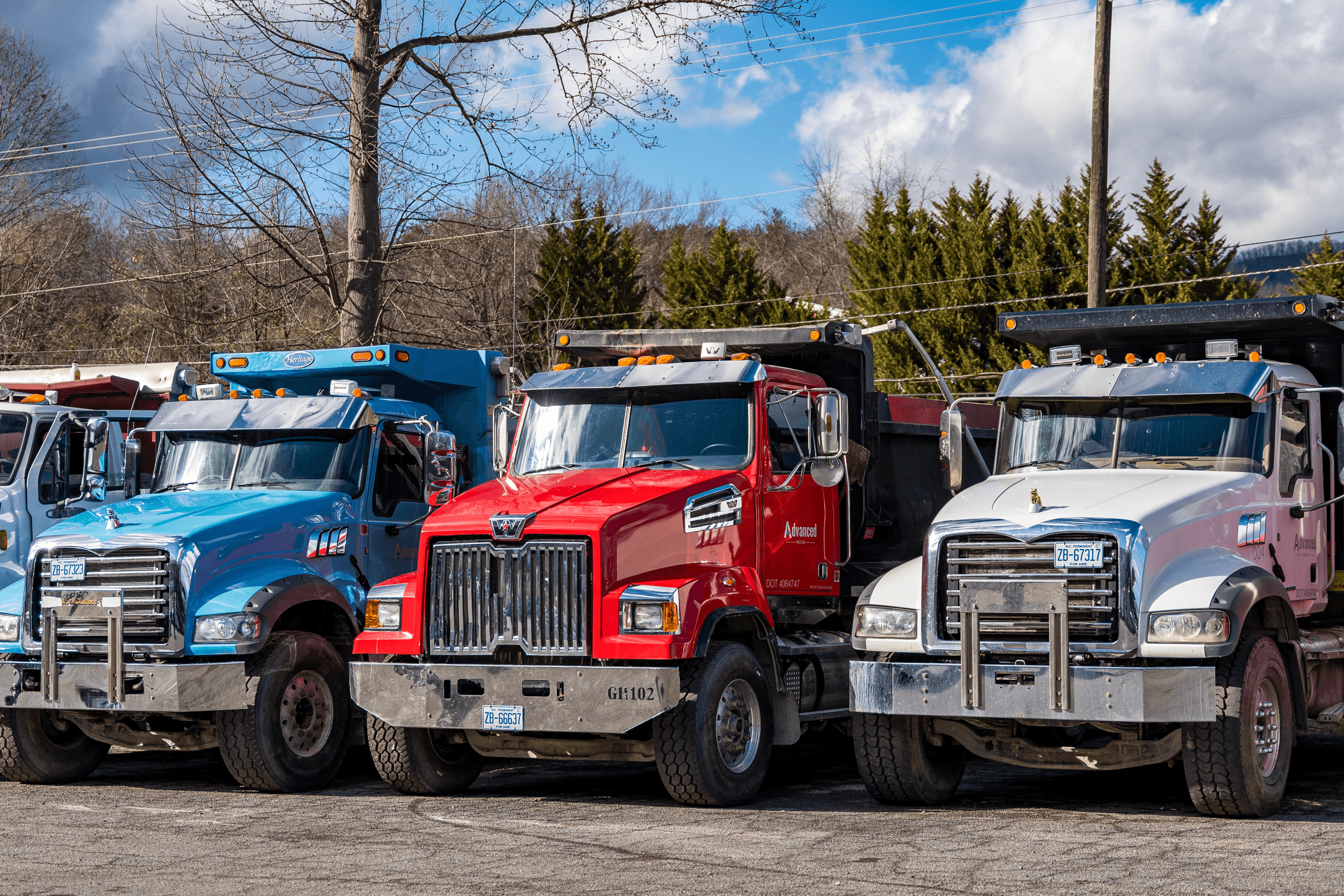 DUMP TRUCKS ON THE PARKING LOT