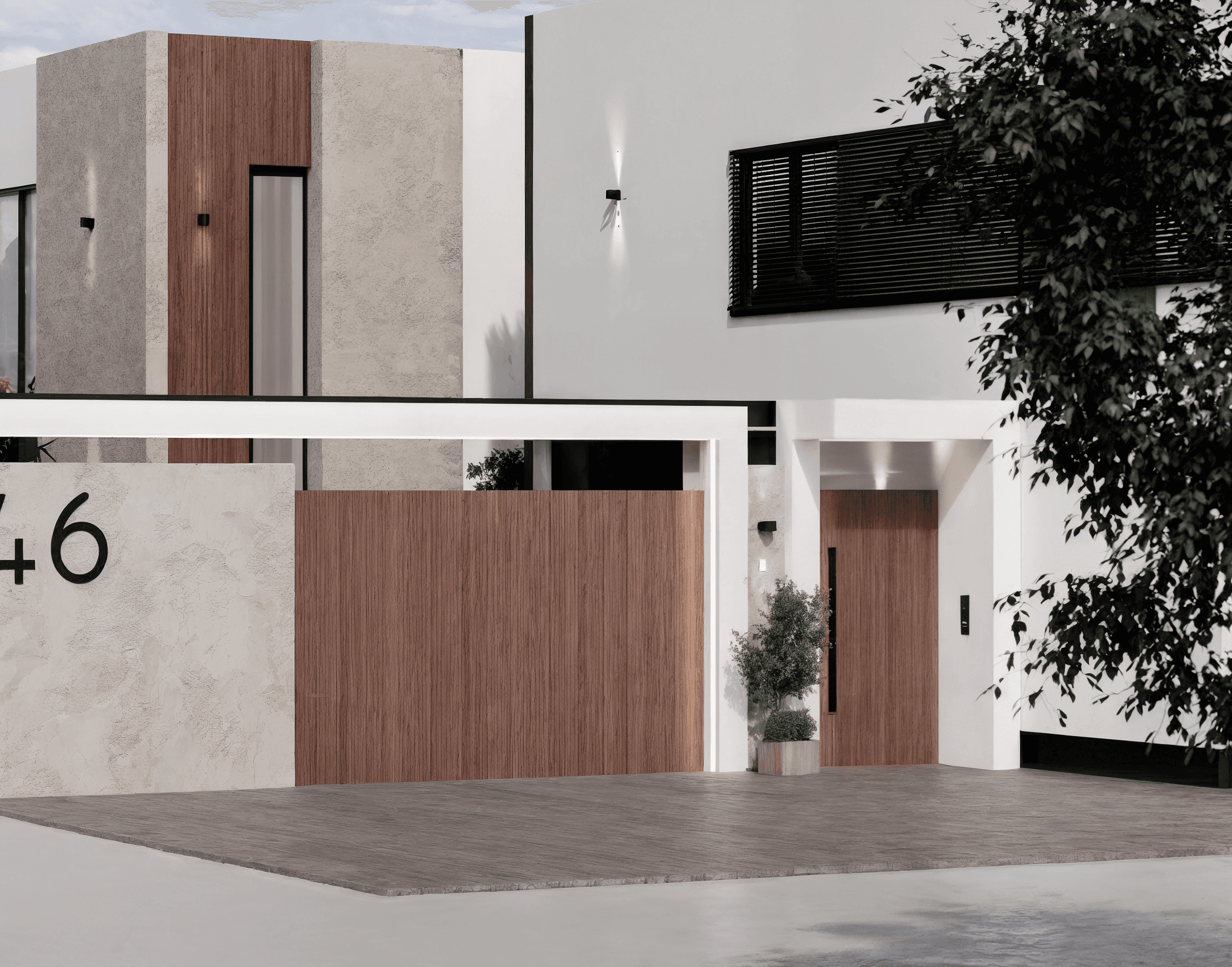 Modern interior entrance with floor-to-ceiling glass walls and warm timber cladding overlooking landscape