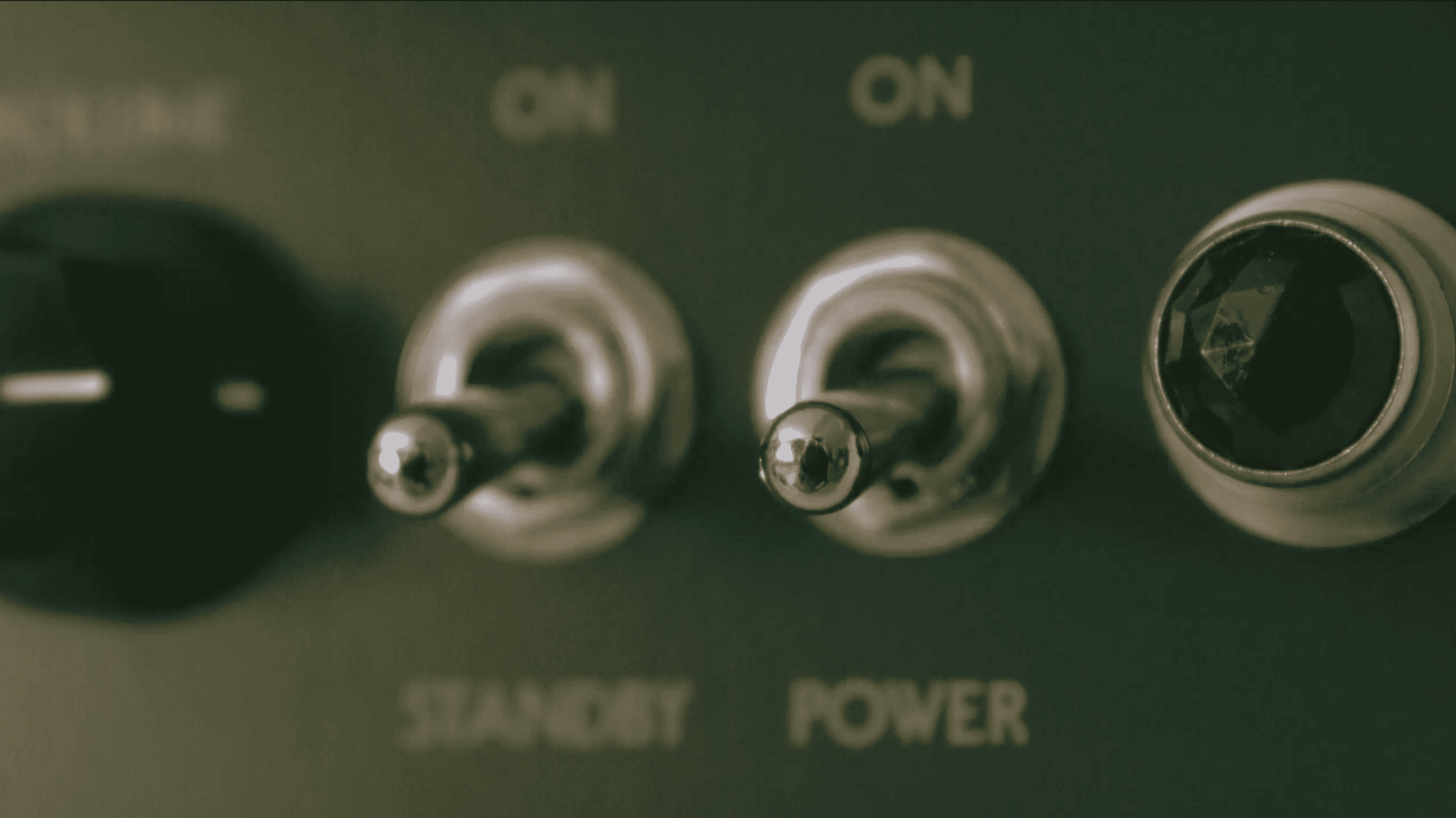 kids lying on a glass land and smiling