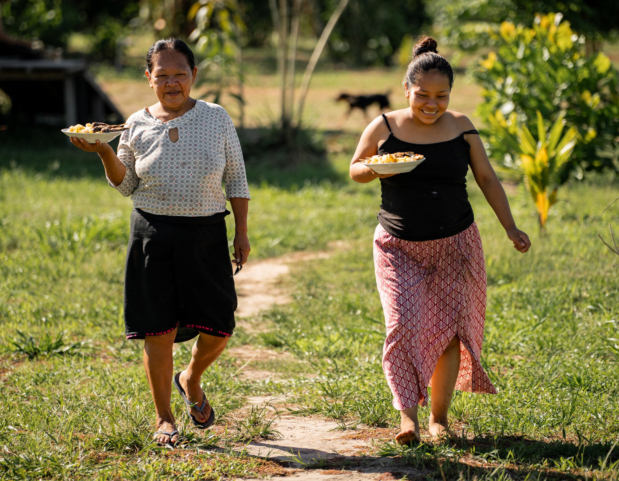 Food being carried by Shamans and Famiky