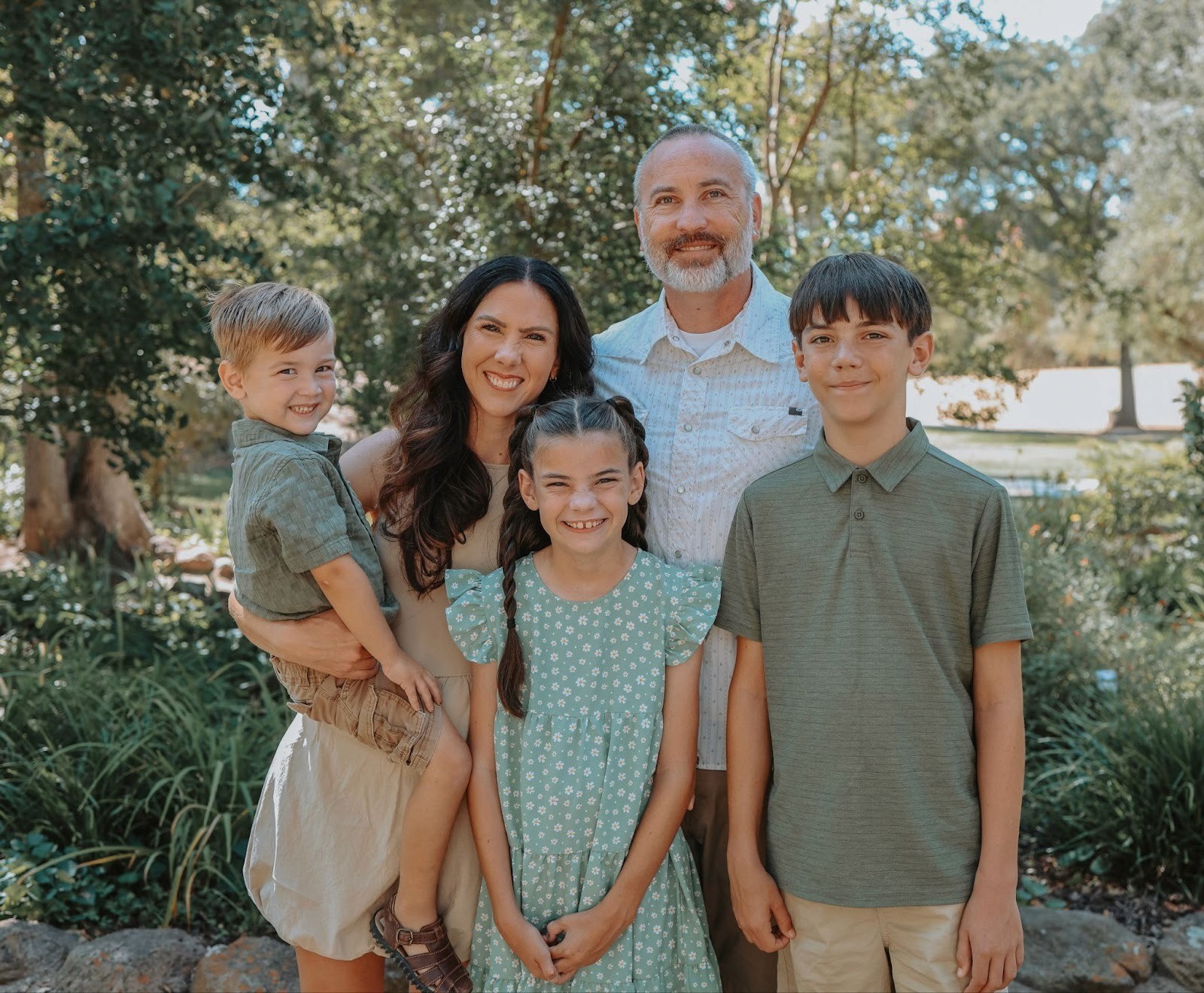 Melissa Schulz with her family, reflecting connection and compassion in her parenting philosophy.
