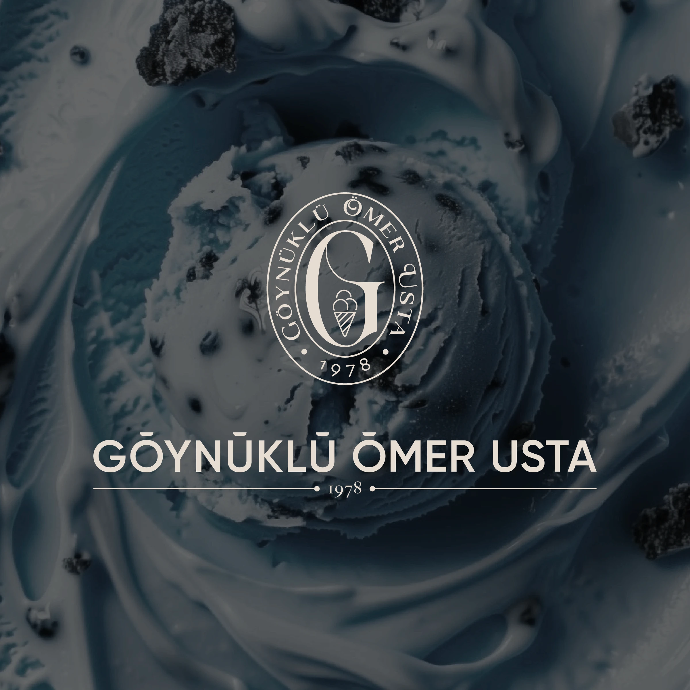 Top-down view of a bowl of white foaming cleanser with airy bubbles on a minimal surface.