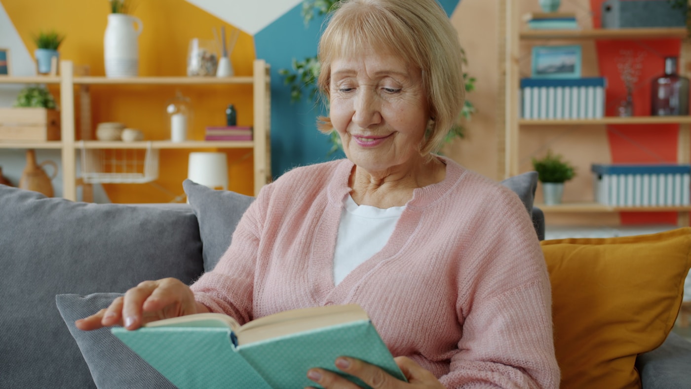 A resident reading at home