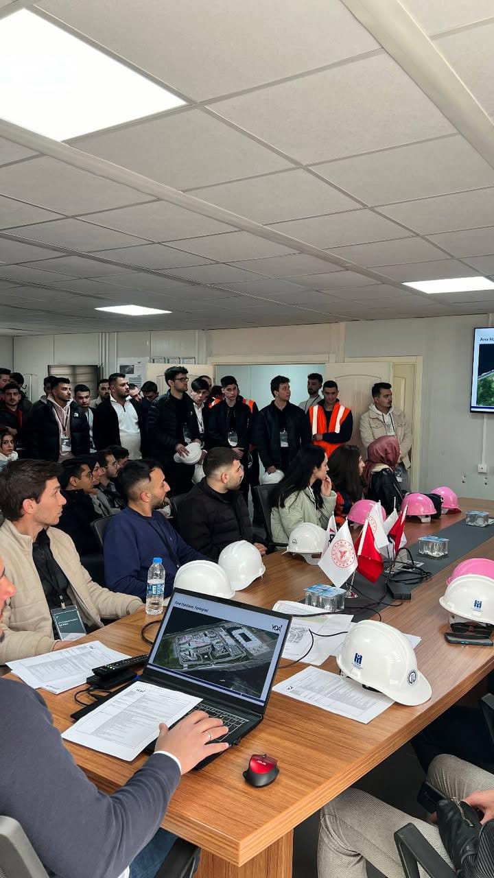 A Man Talking using Microphone in the Conference Room
