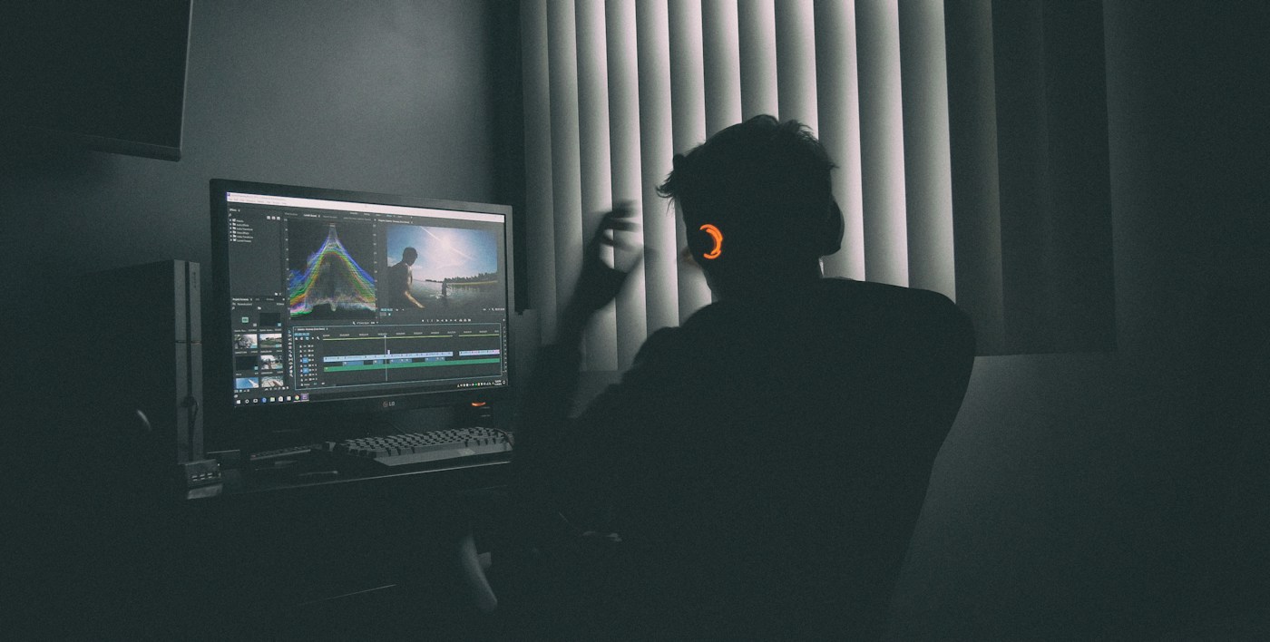 Editor reviewing campaign footage and delivery files at a post-production workstation