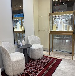 Private consultation area at Vanhess Jewelry Coquitlam where clients review and approve their custom diamond and wedding ring designs.