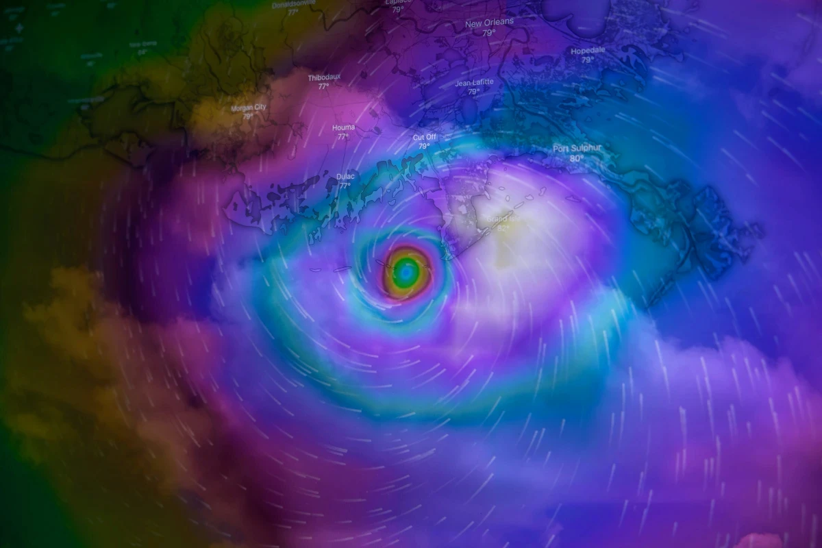 Hurricane eye over Louisiana coast with colorful storm bands.