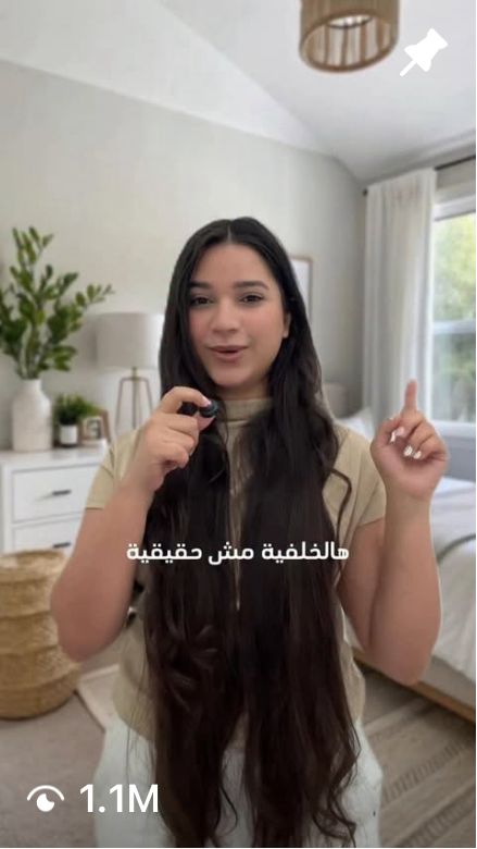 black DSLR camera floating over man's hand at the woods