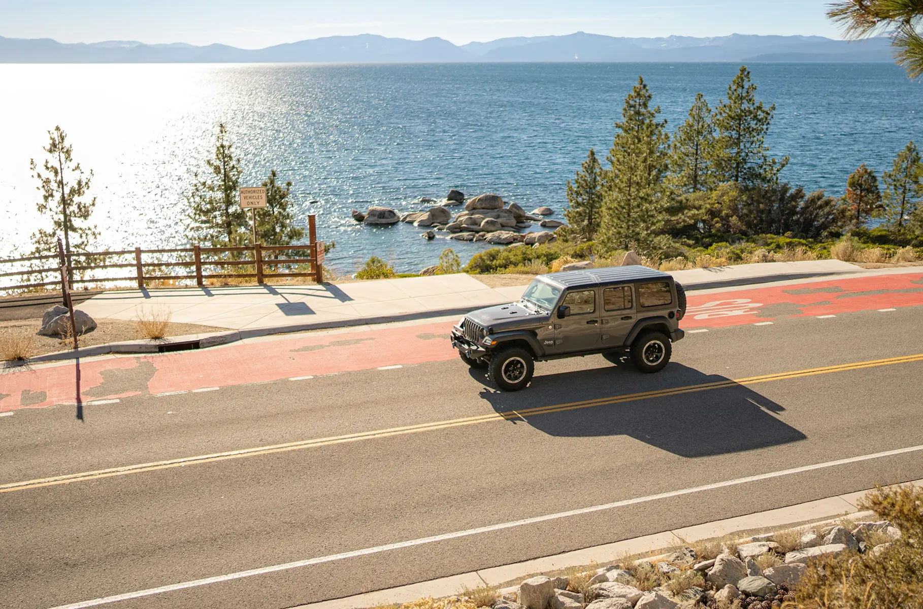 Car rental vehicle on the road used as a visual example for car rental website SEO content.