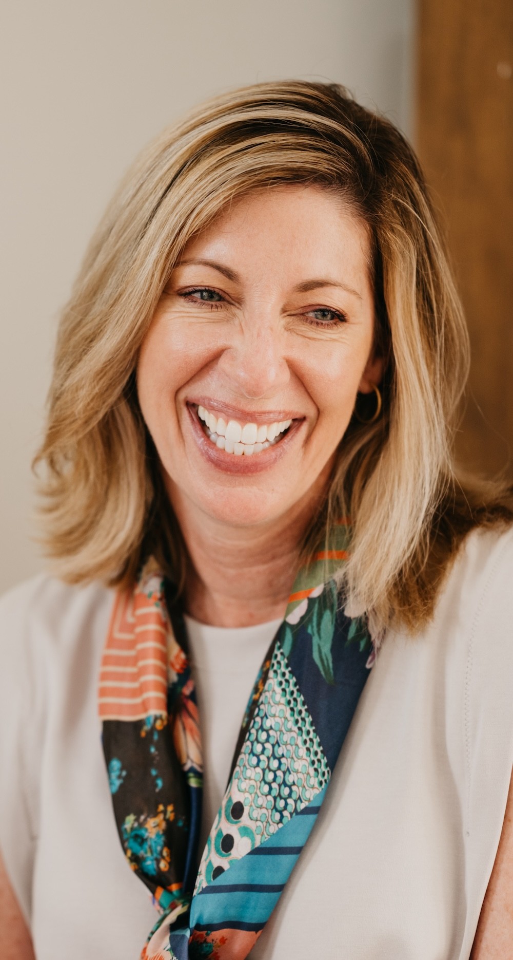 Profile portrait with natural lighting featuring long blonde hair