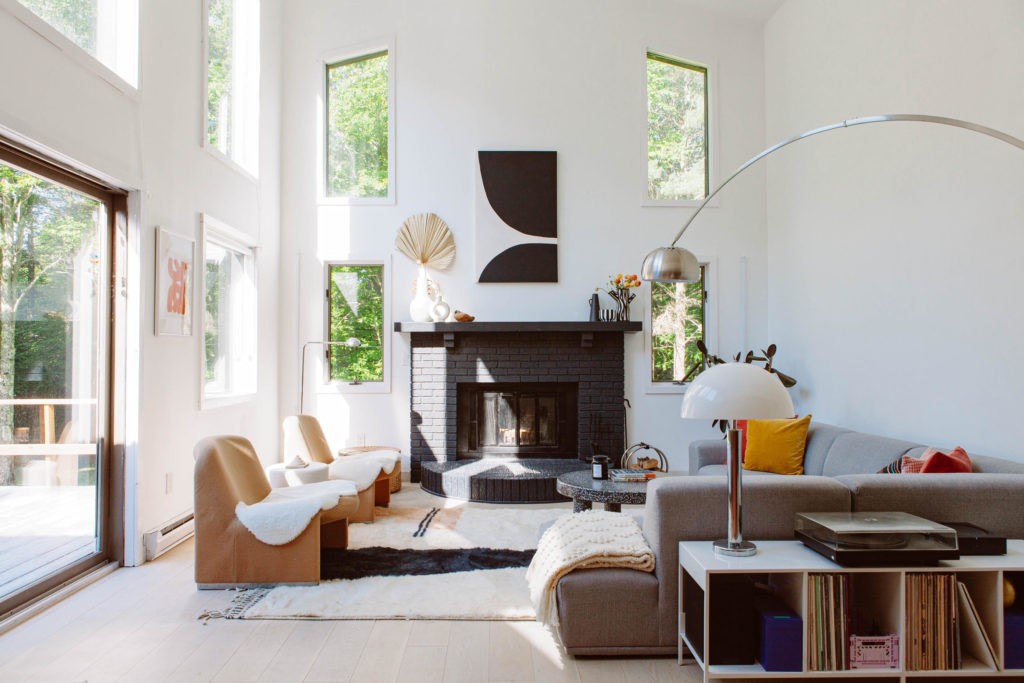 living room with big fireplace and furniture