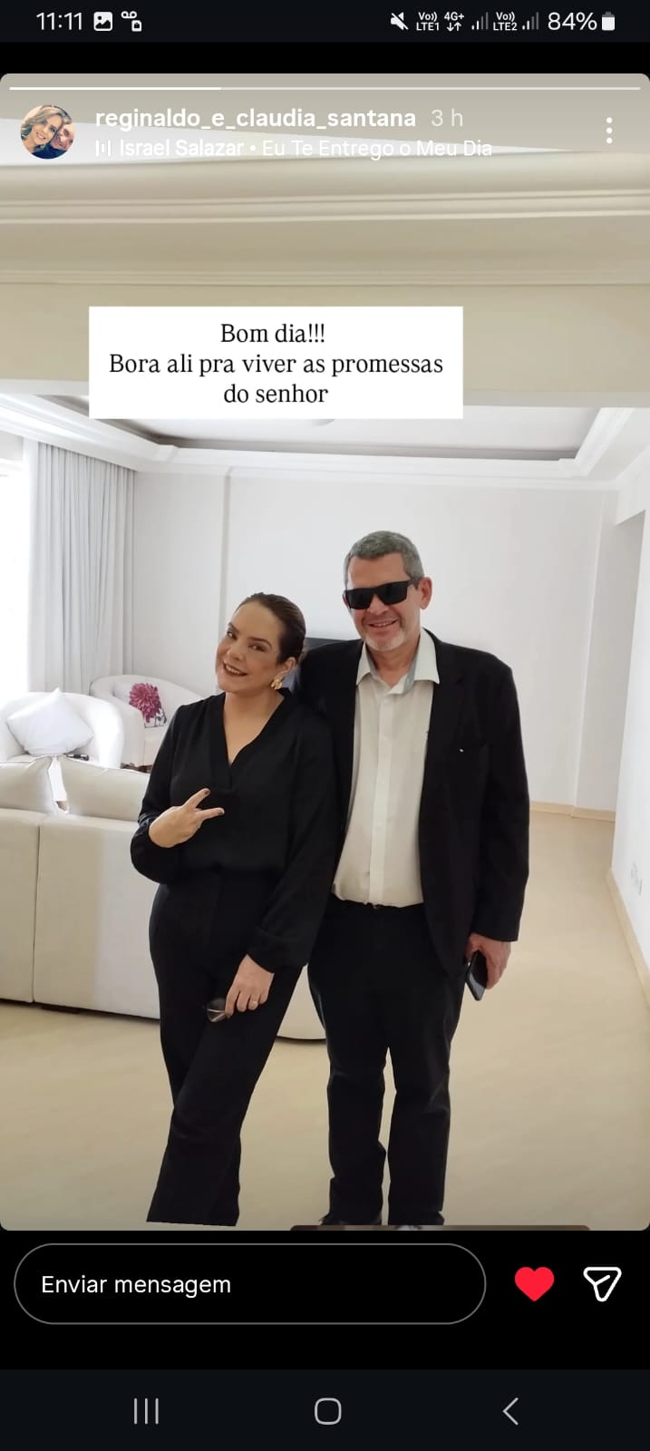 man in gray suit jacket and black pants standing on brown concrete pathway during daytime