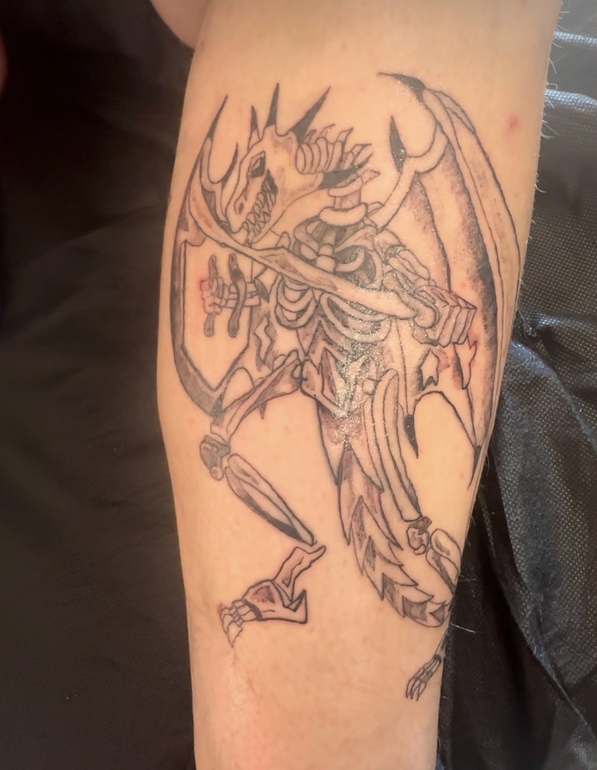 Dragon Bones tattoo by Mario Ink Chicago