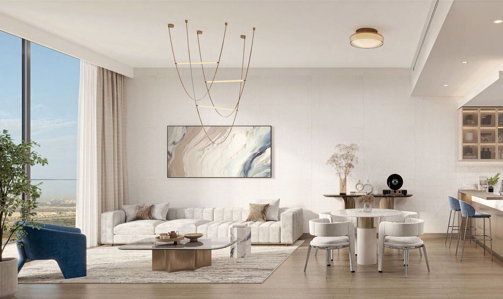 Modern living room and kitchen area of Windsor House II, featuring contemporary furnishings and an open layout.