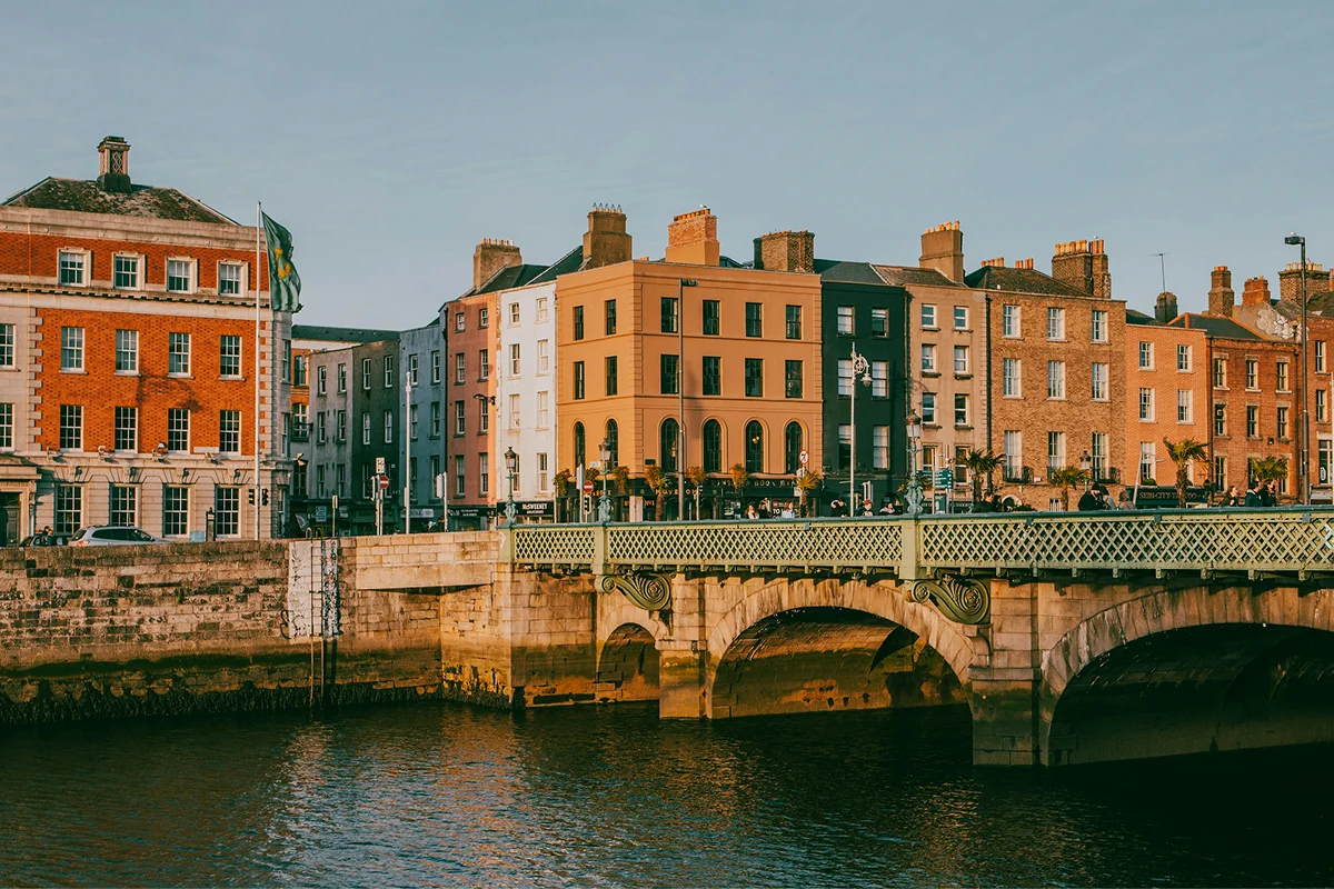 Dublin waterfront buildings and a bridge along the River Liffey.