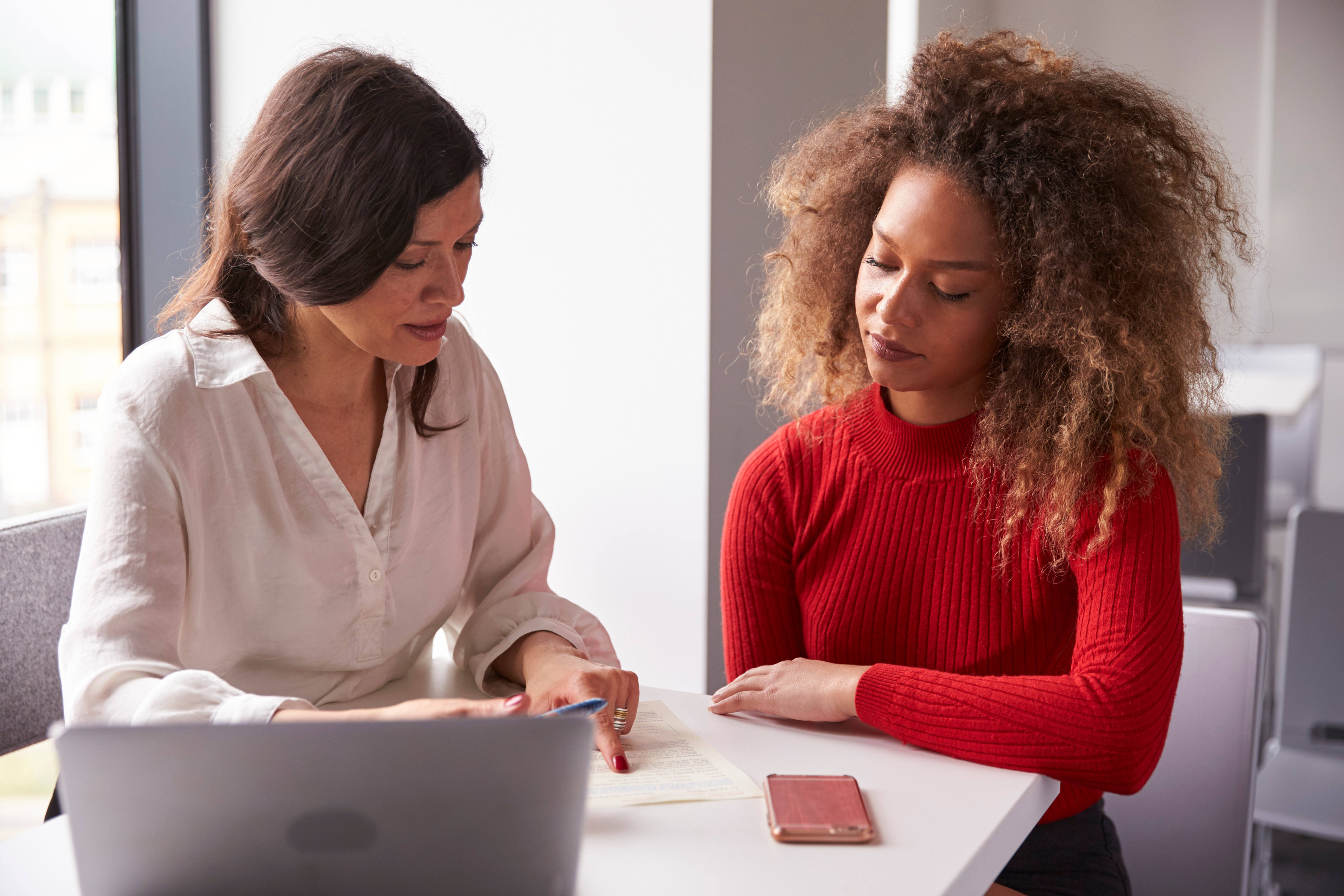 Female Student Working One To One With Tutor