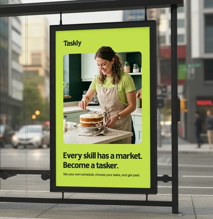 Image of a bus bus billboard for Taskly app