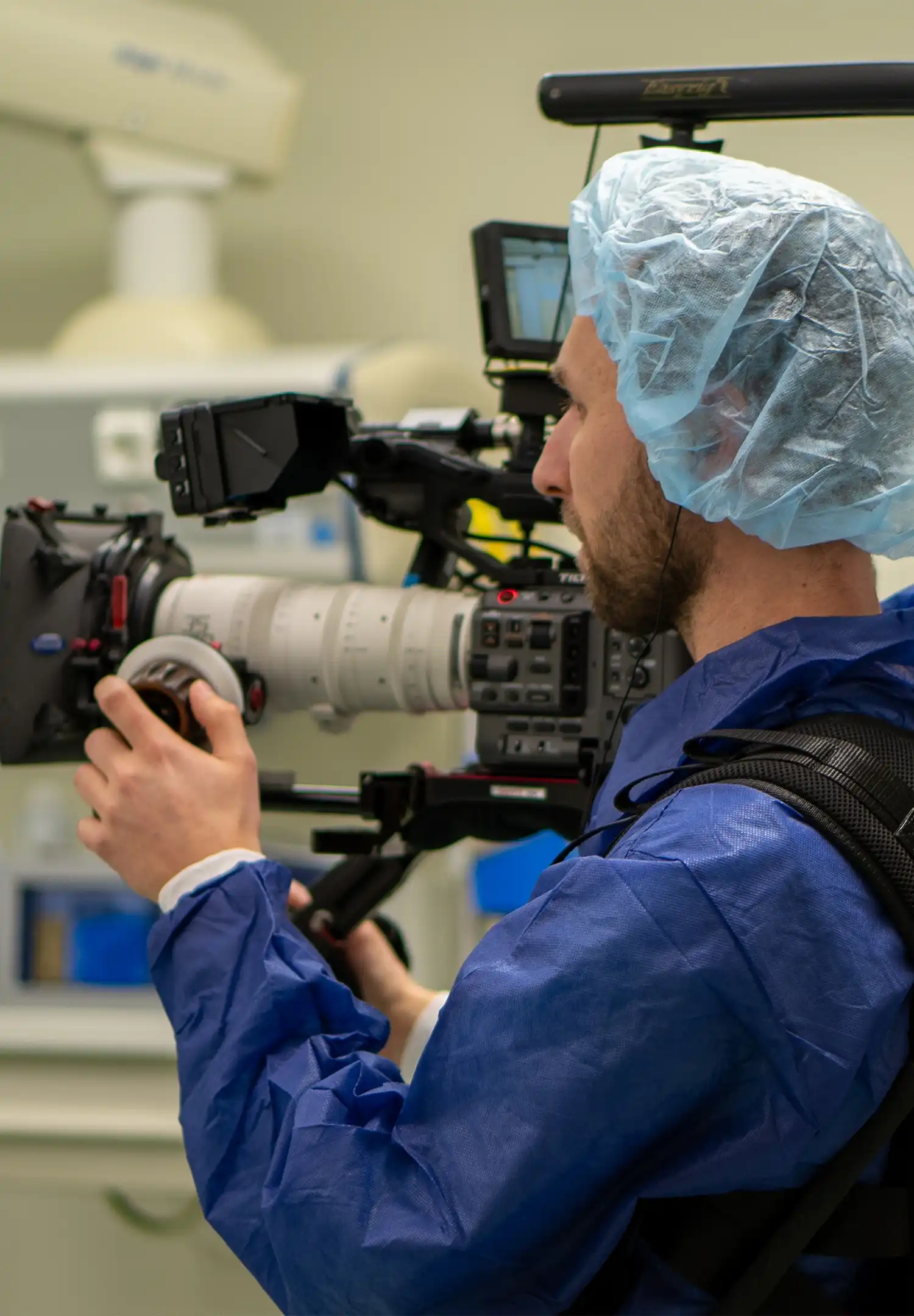 Close-up cameraman from Indall in a medical environment