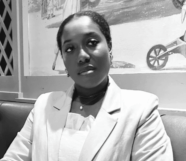 a man and a woman standing in a field