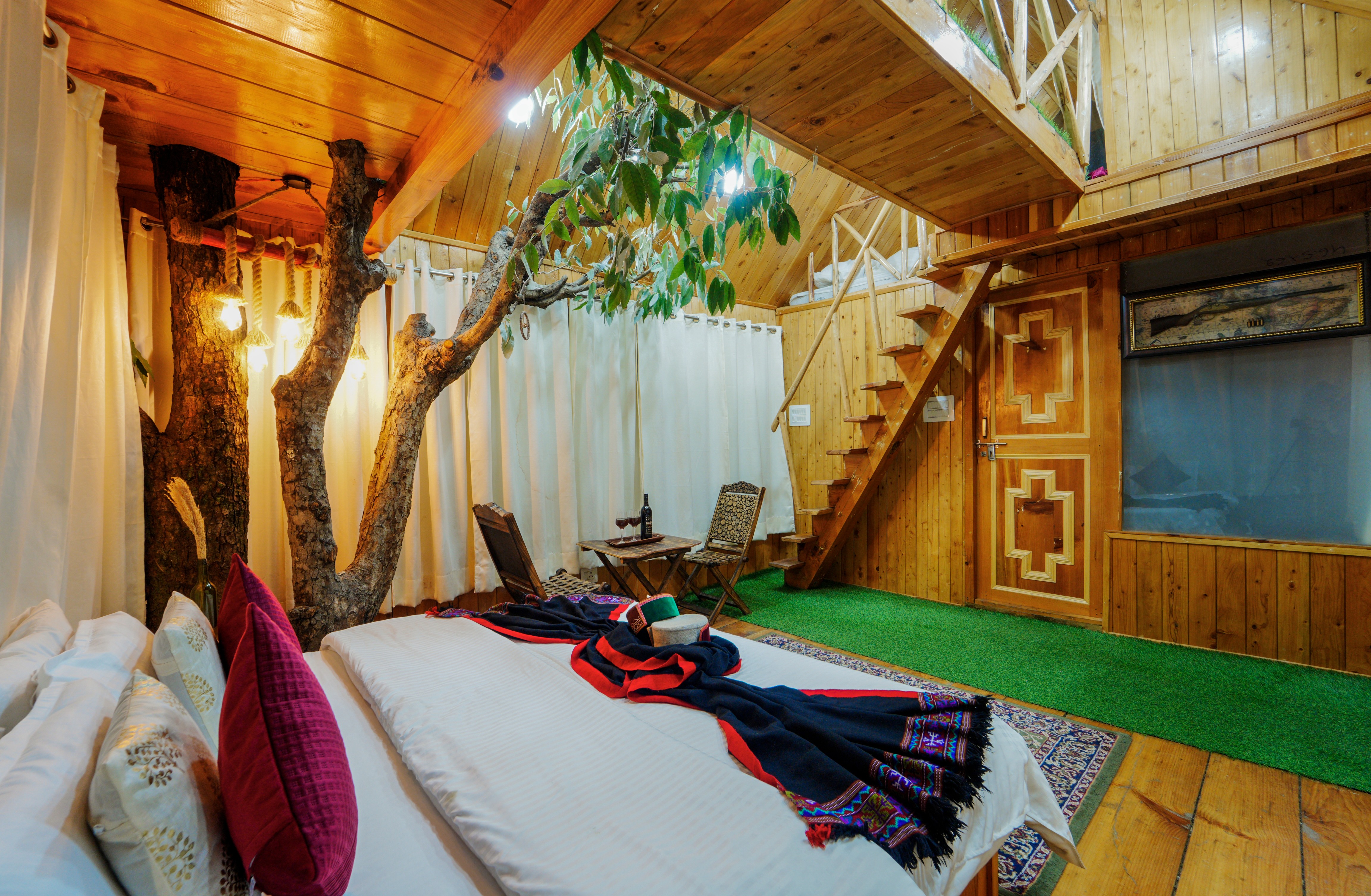 Tree House exterior surrounded by branches