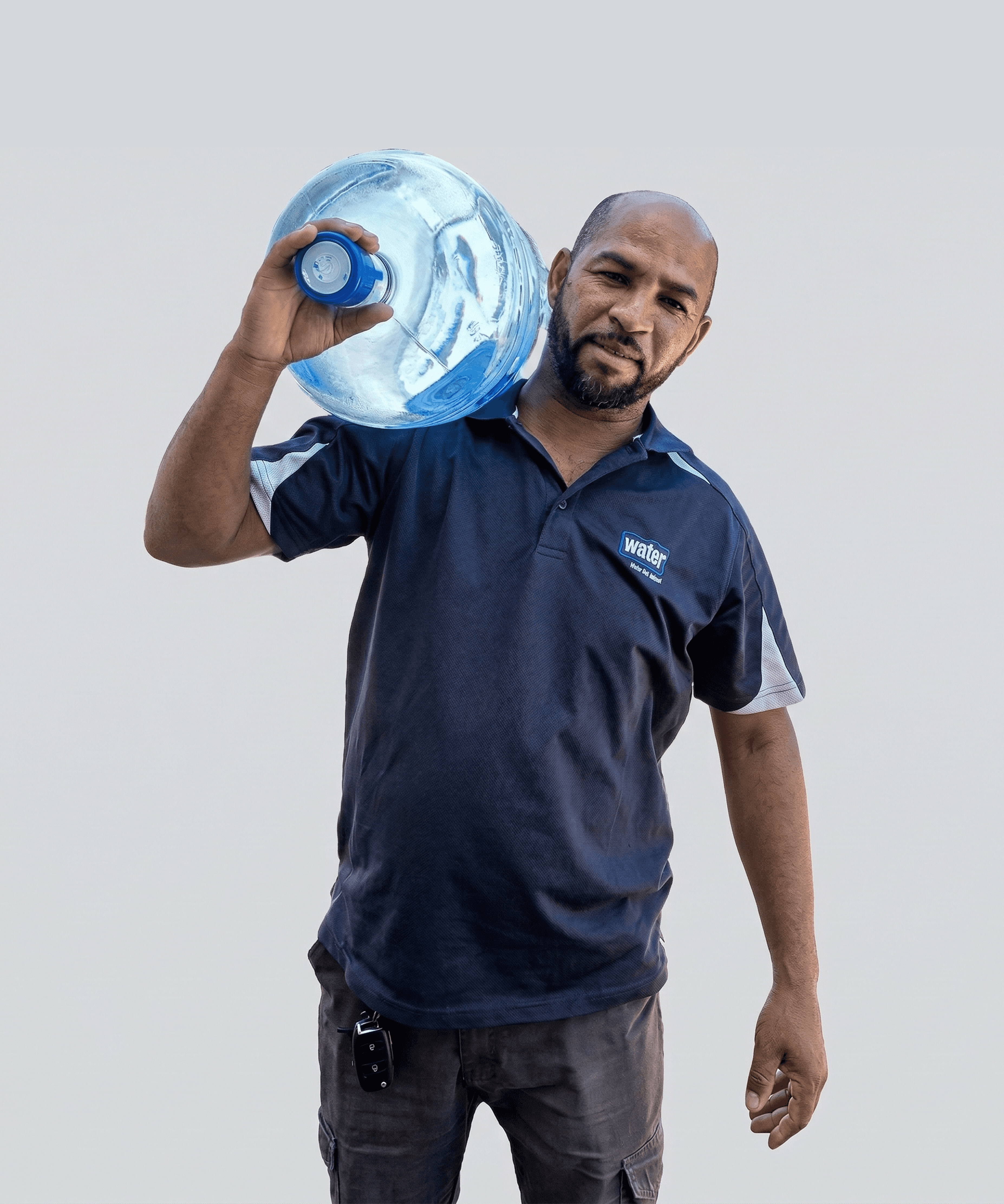 Water delivery man carries a watter bottle