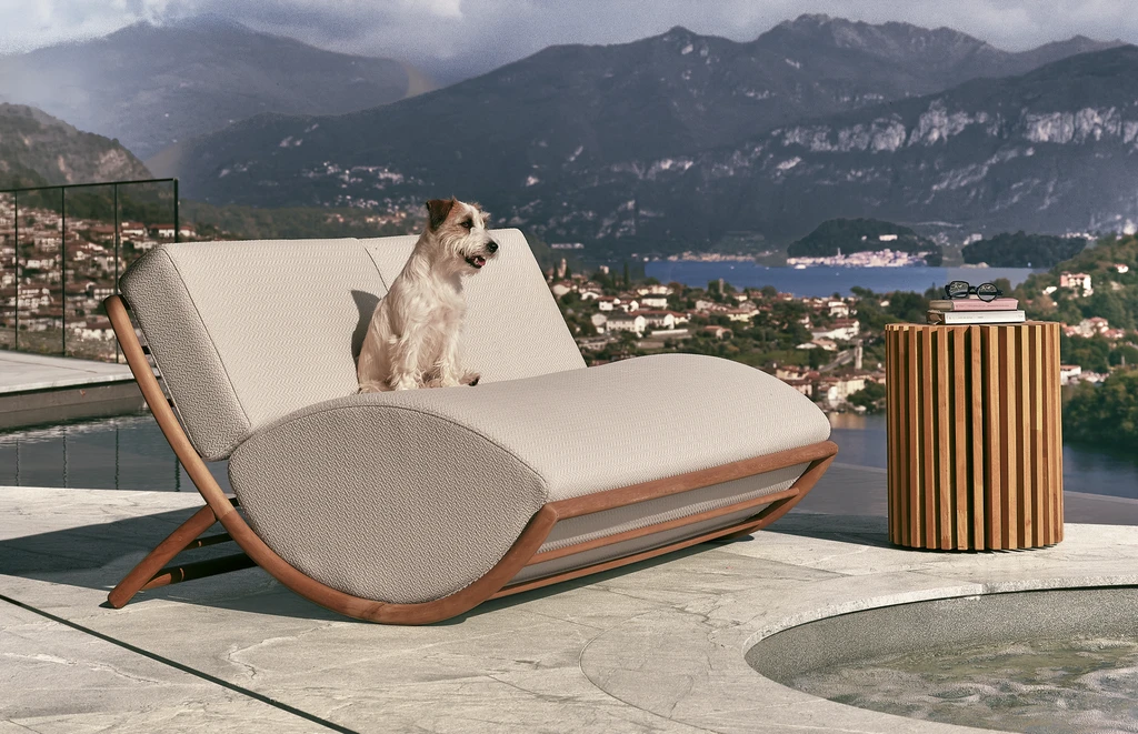 side view of luxury outdoor sofa with single seat cushion and two removable backrest cushions, crafted with a solid wood frame and weather-resistant fabric – refined design for elegant open-air environments